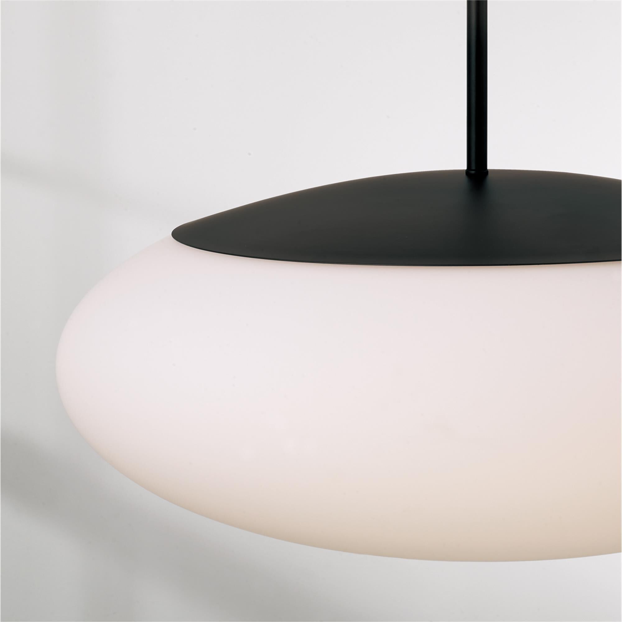 Shown in Matte Black finish and Soft White glass