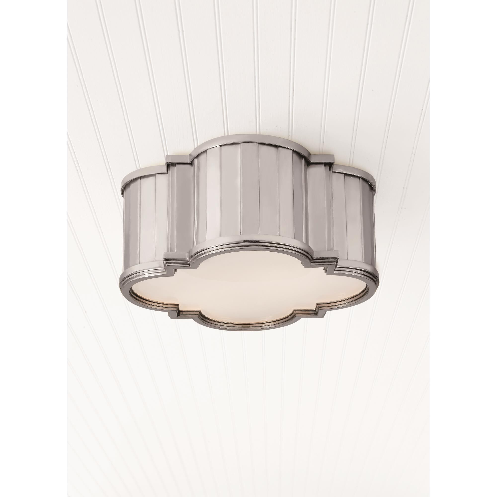 Shown in Polished Nickel finish and White glass