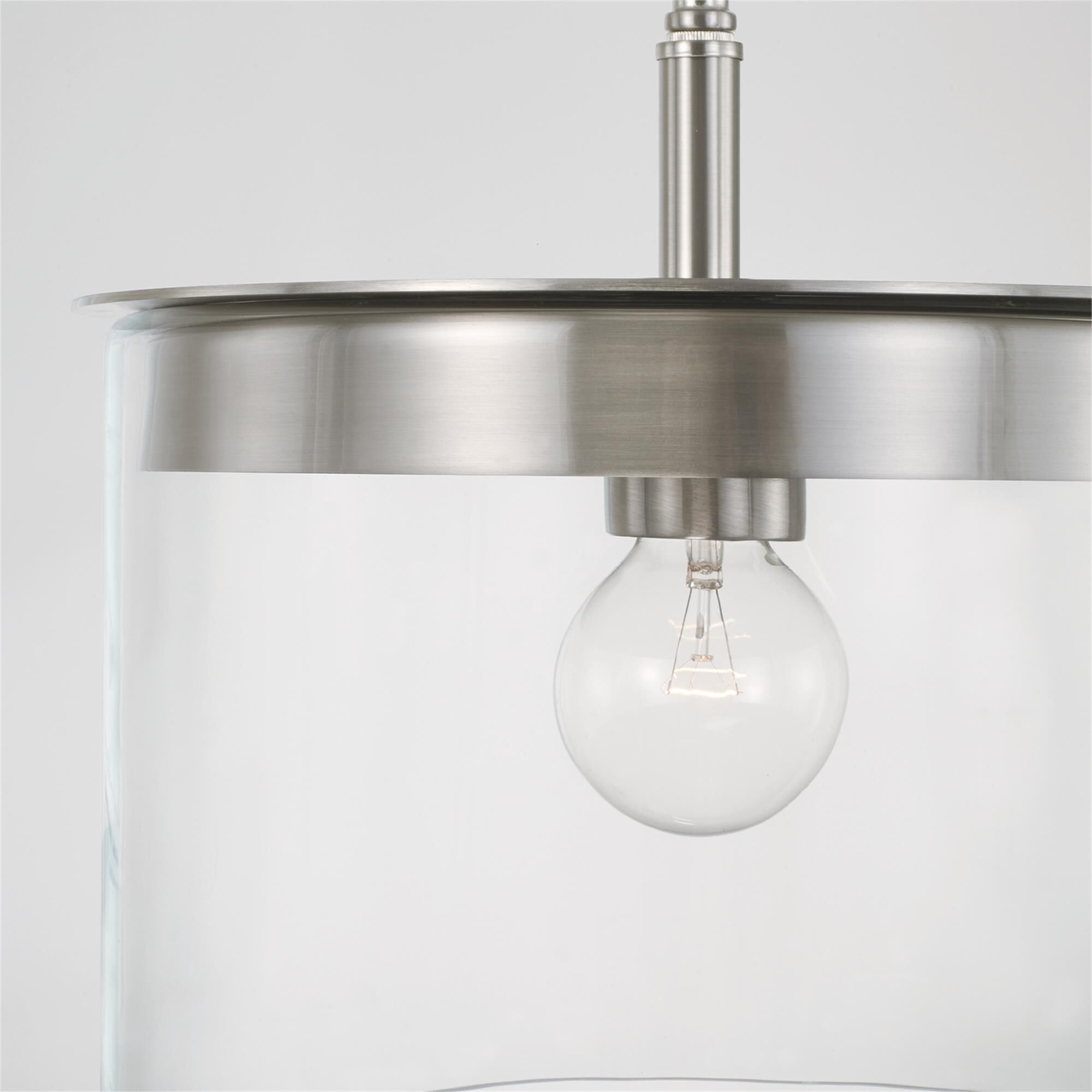 Shown in Brushed Nickel finish and Clear glass