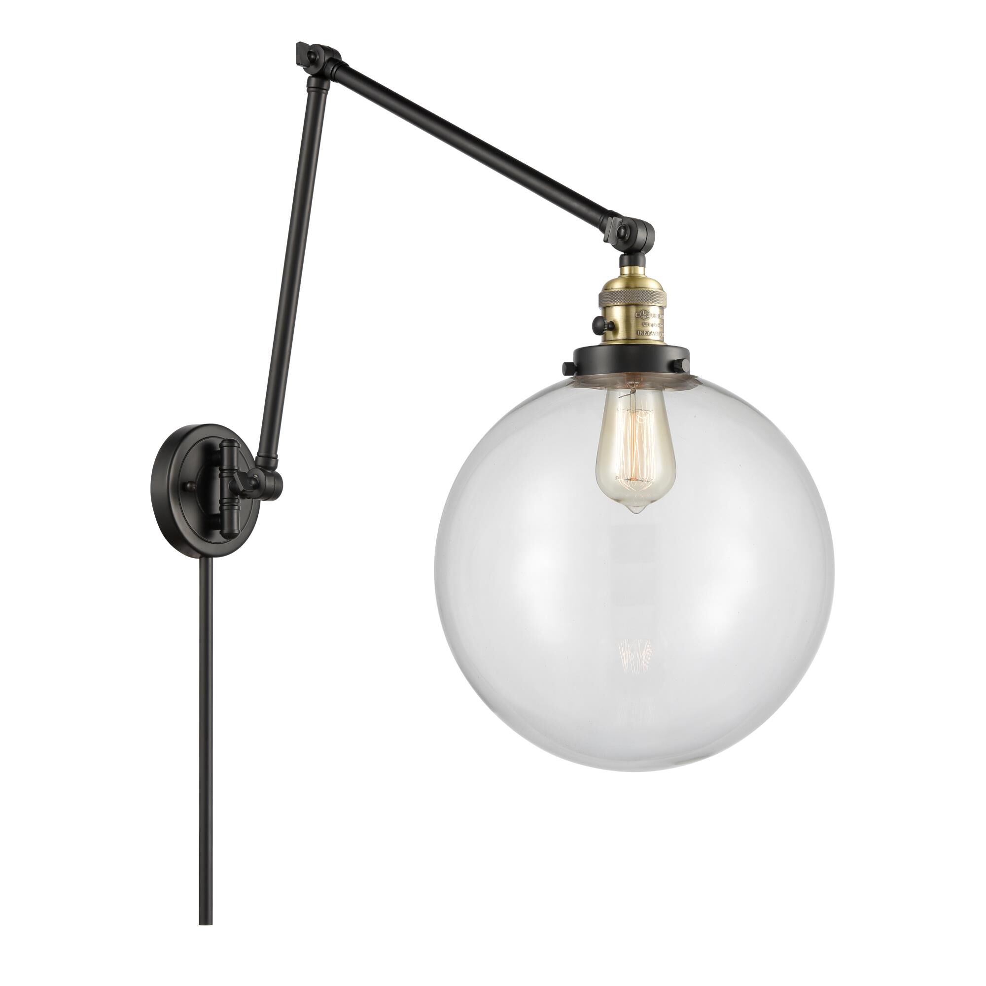 Shown in Black Antique Brass finish and Clear Beacon glass