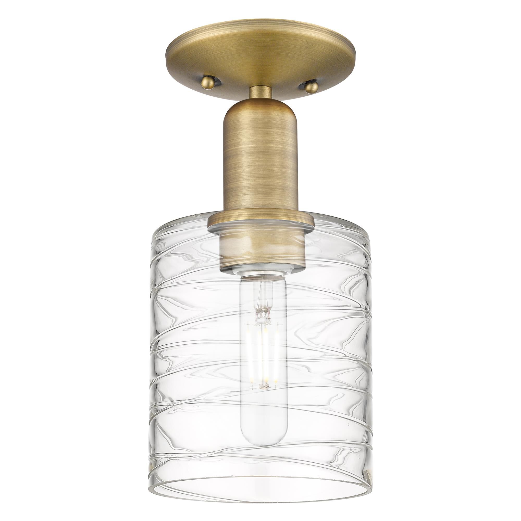 Shown in Brushed Brass finish and Deco Swirl glass
