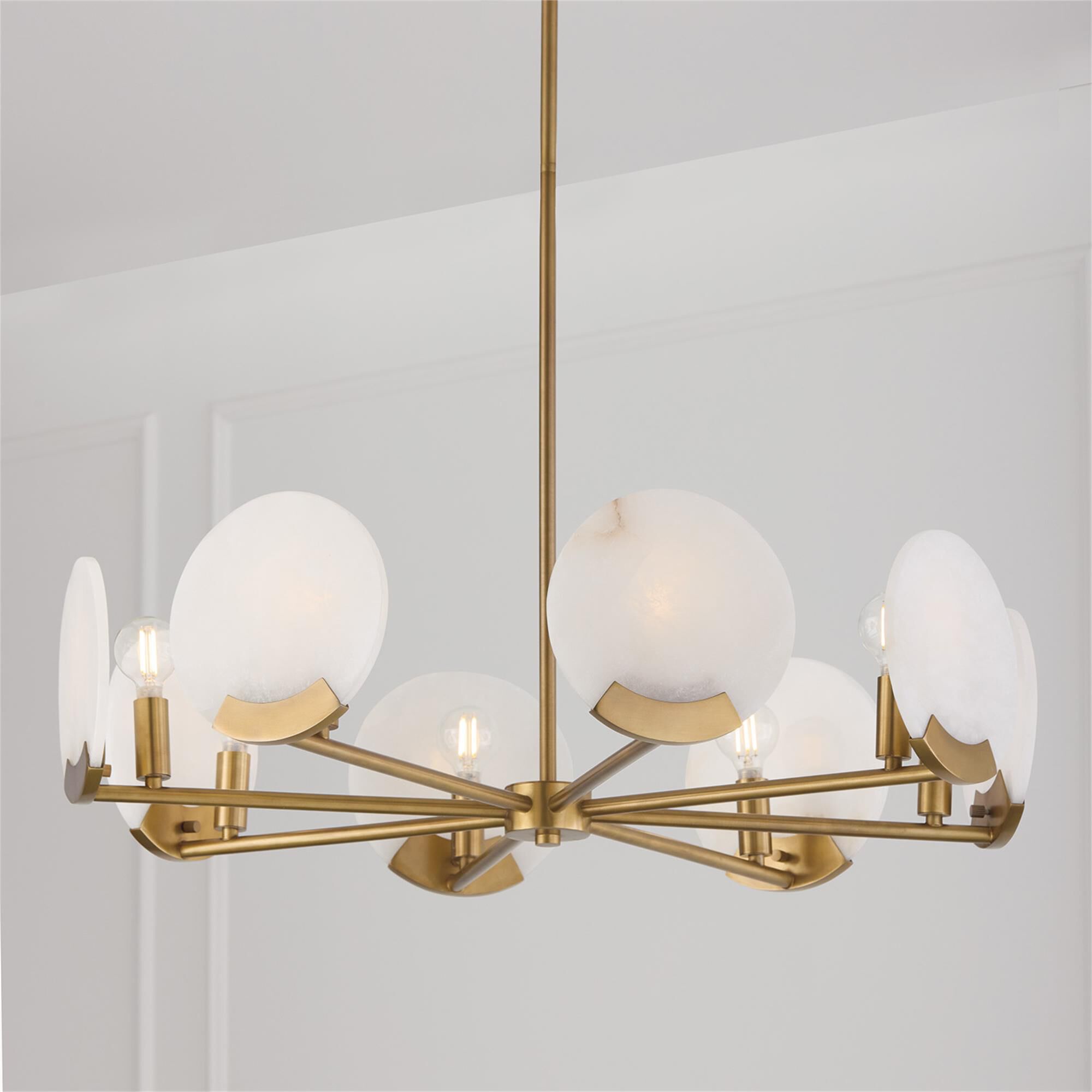 Shown in Aged Brass finish and Natural Alabaster Stone glass