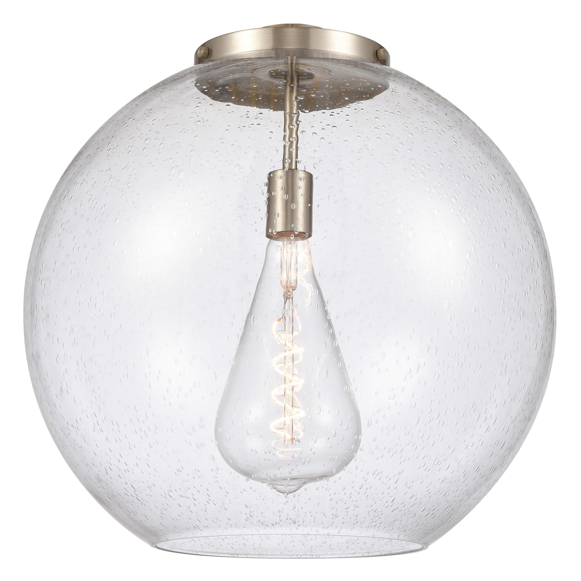 Shown in Antique Brass finish and Seedy glass