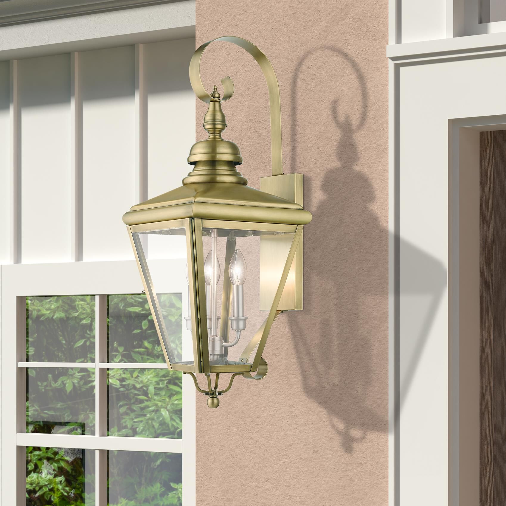 Shown in Antique Brass With Brushed Nickel Cluster finish and Clear glass