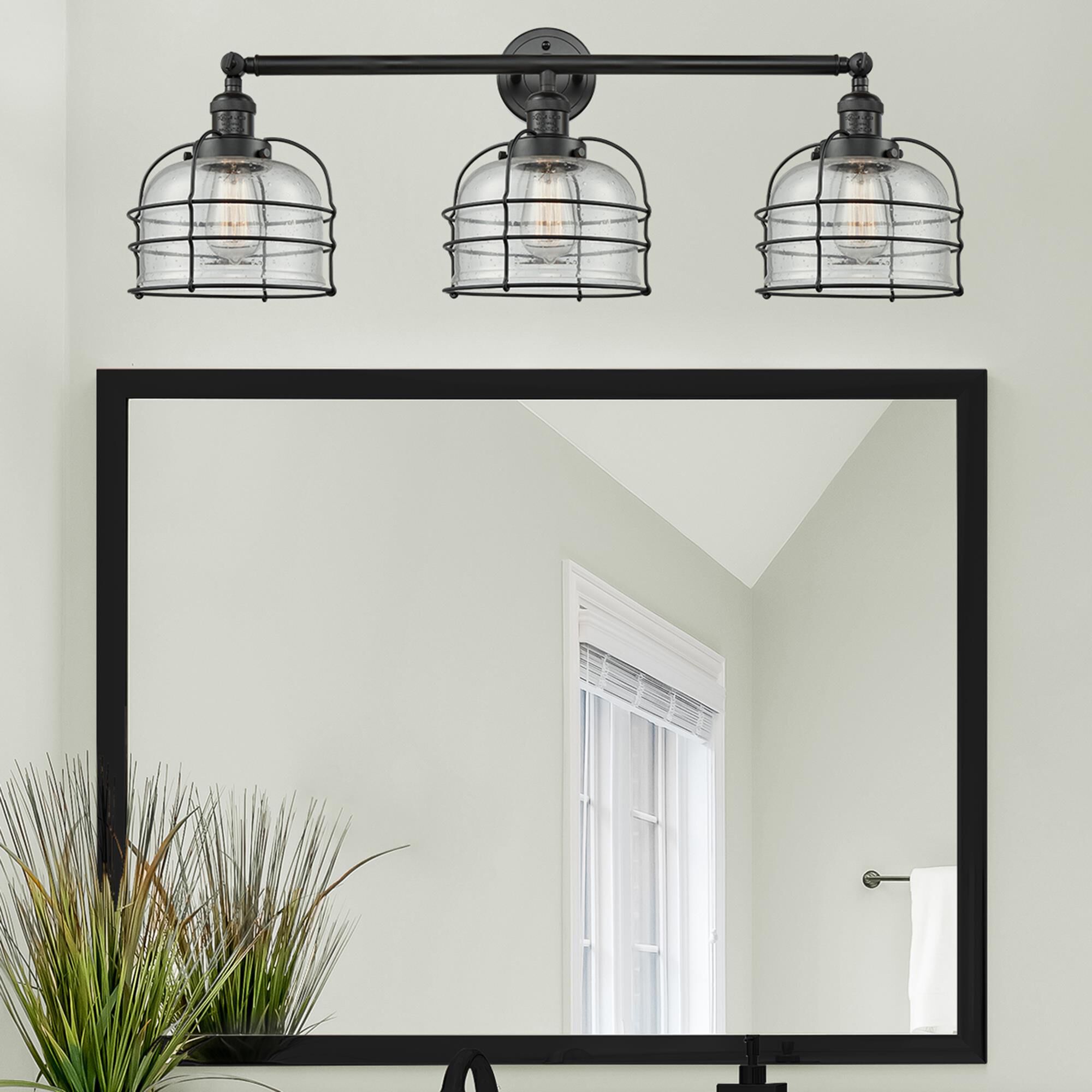 Shown in Matte Black finish and Seedy Large Bell Cage glass and Matte Black accent