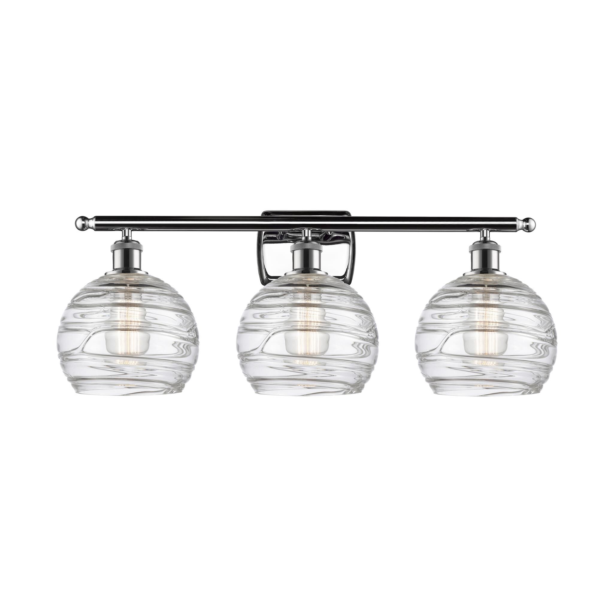 Shown in Polished Chrome finish and Clear Deco Swirl glass