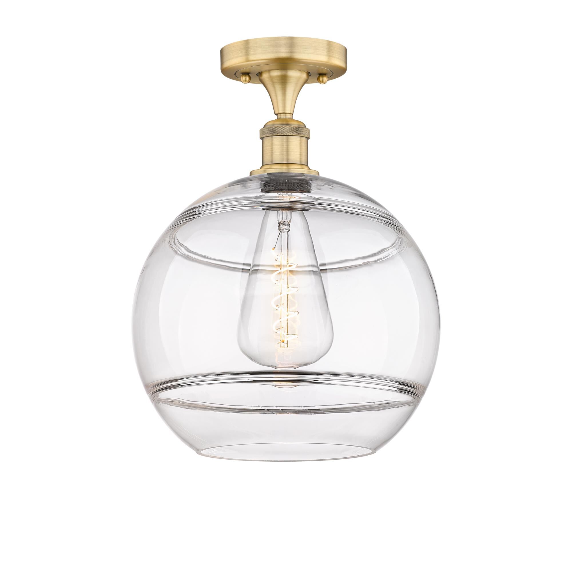 Shown in Brushed Brass finish and Clear glass