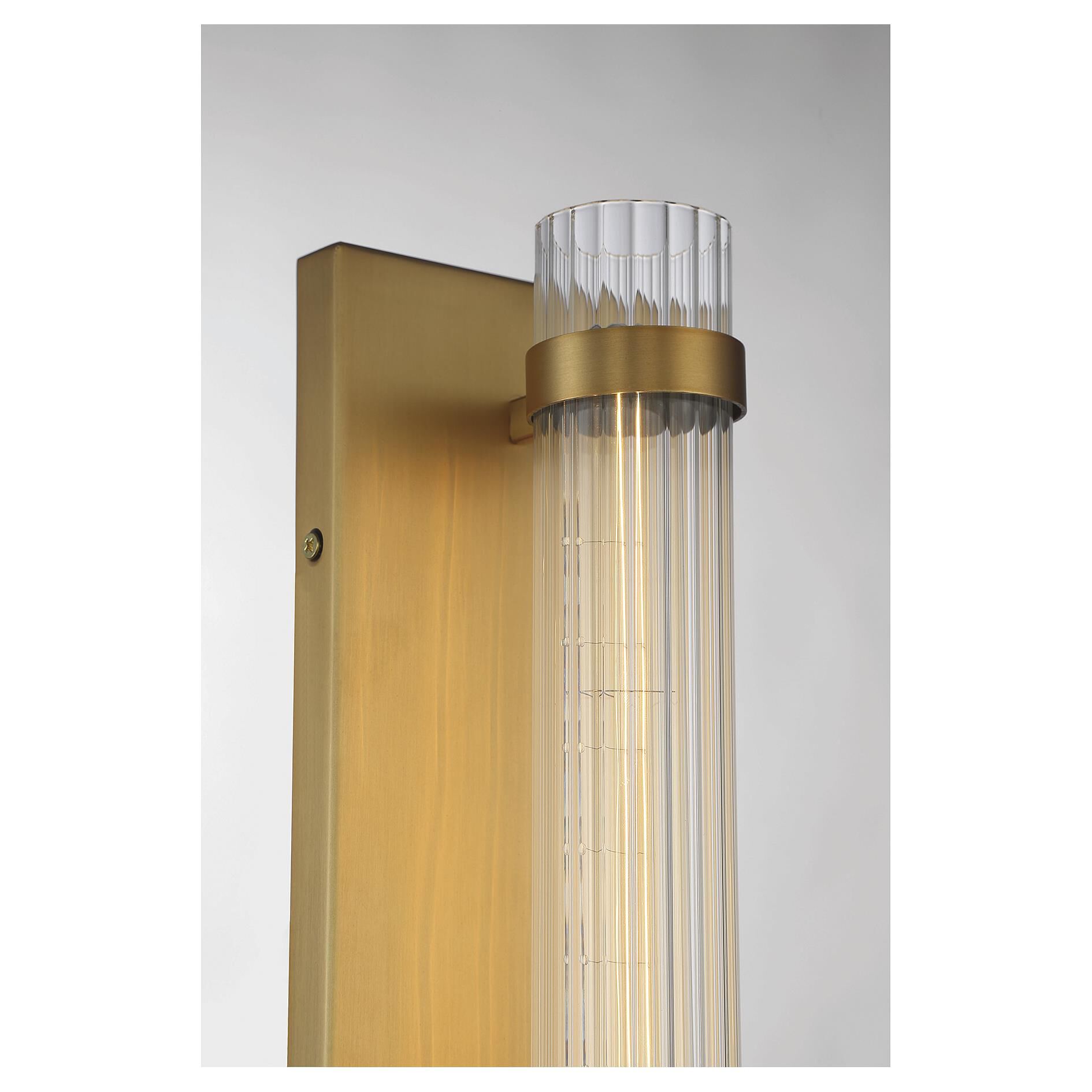 Shown in Warm Brass finish and Reeded glass