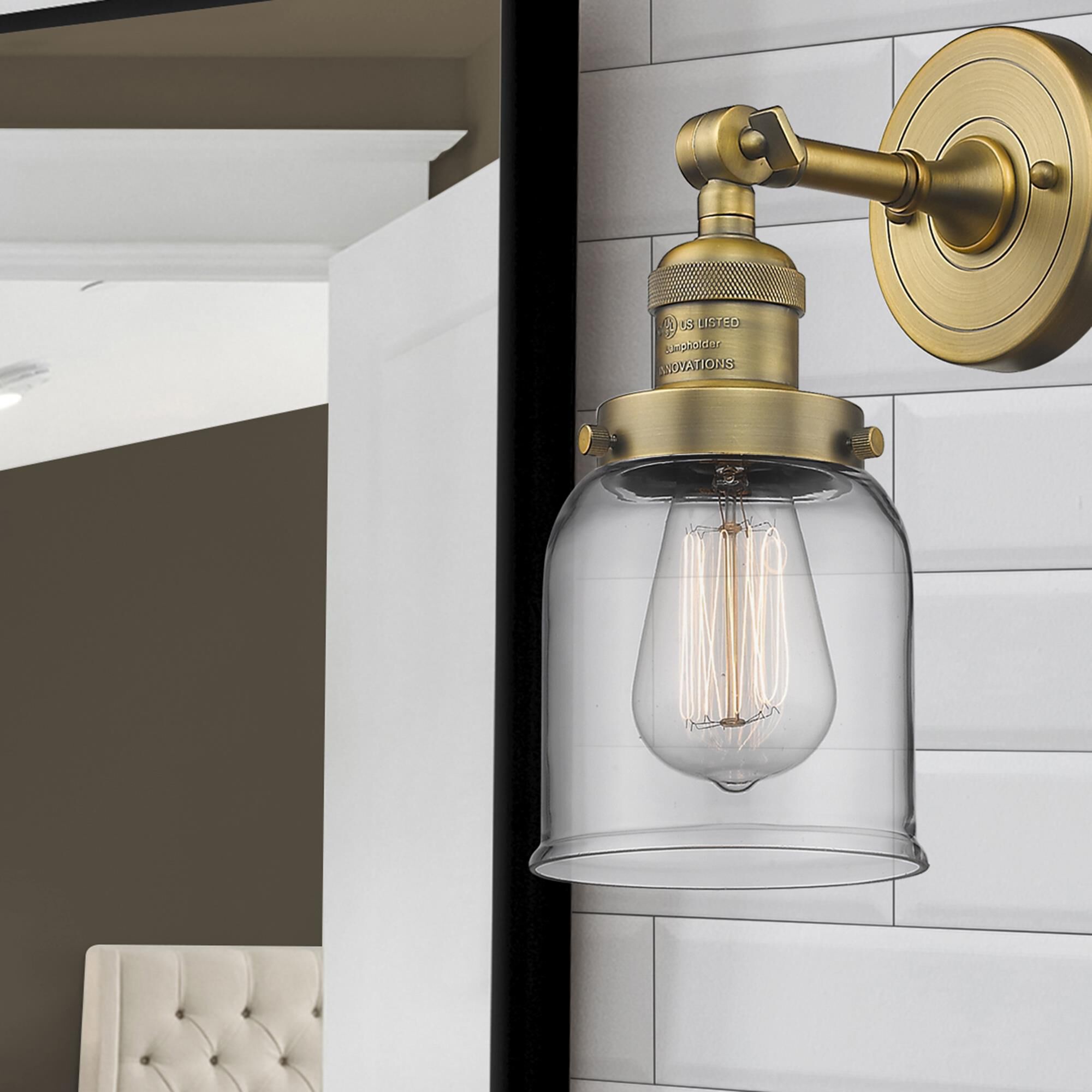 Shown in Brushed Brass finish and Clear glass