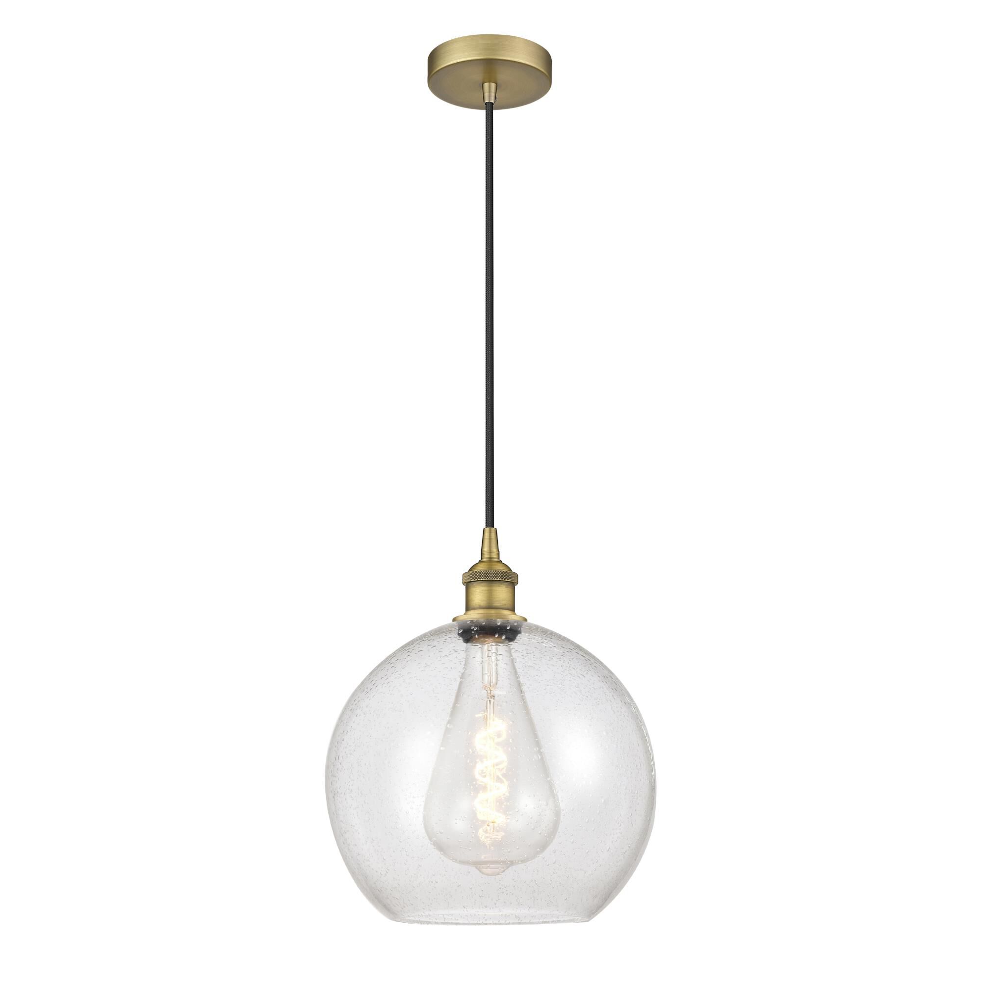 Shown in Brushed Brass finish and Seedy glass