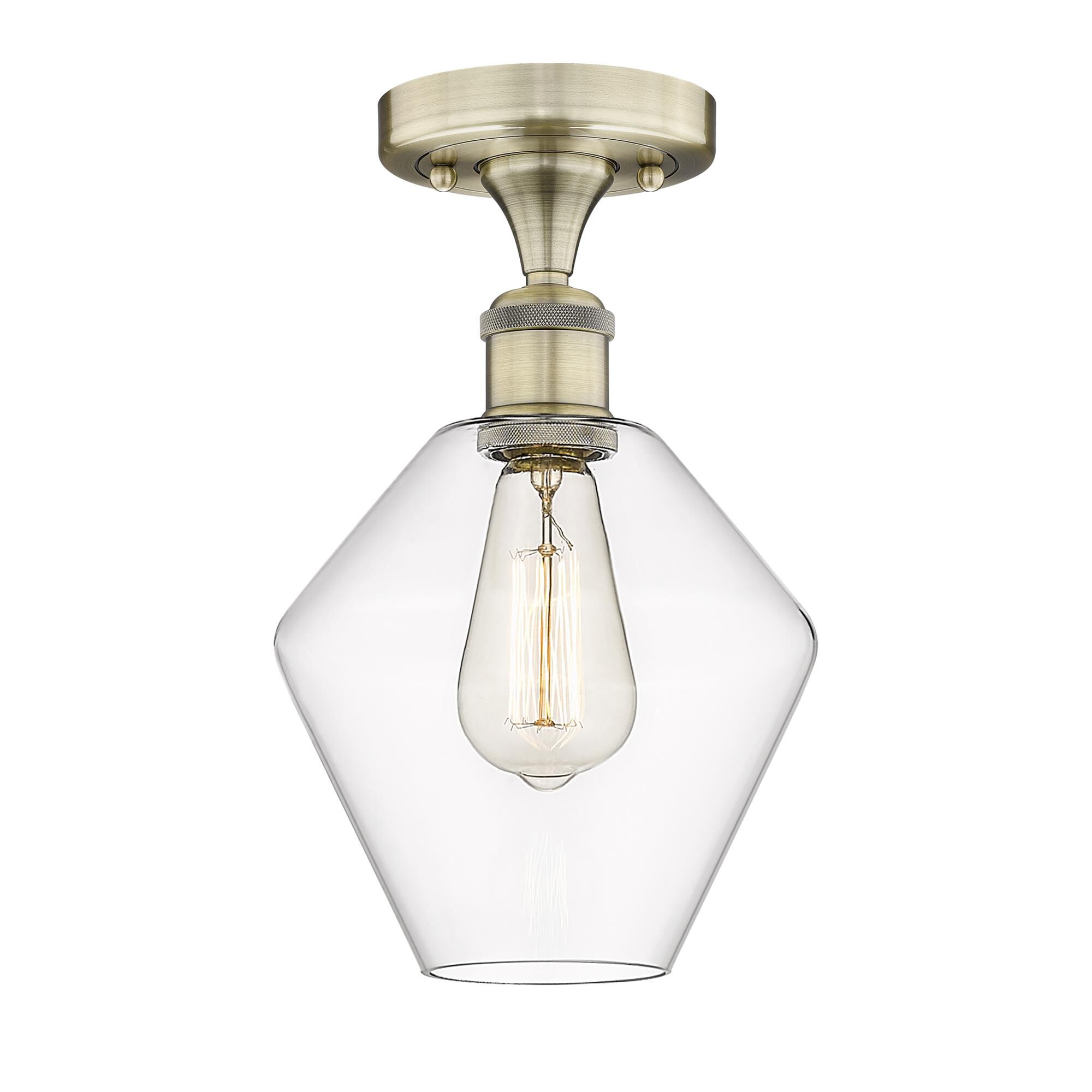 Shown in Antique Brass finish and Clear glass