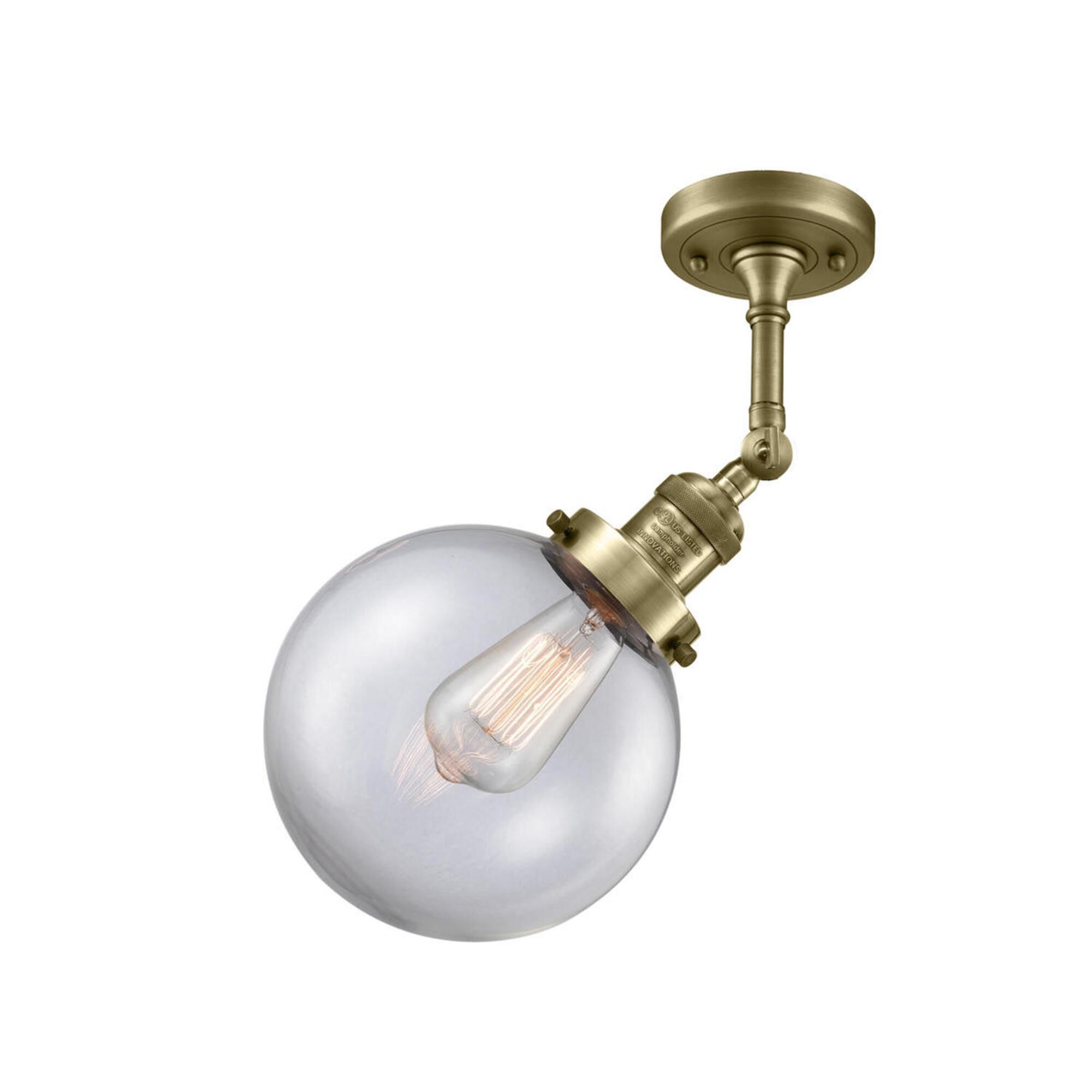 Shown in Antique Brass finish and Clear glass and No Accent accent