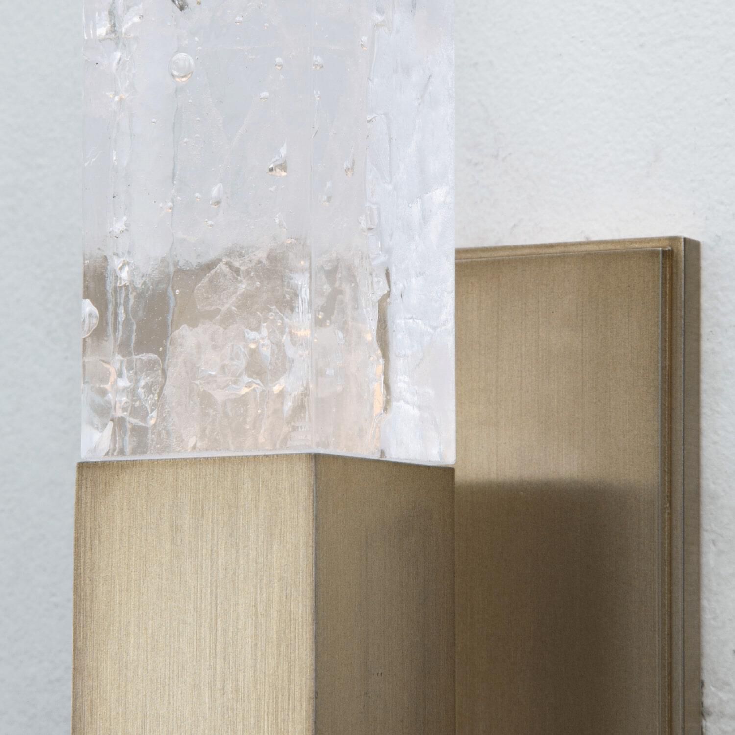 Shown in Novel Brass finish and Clear Cast glass