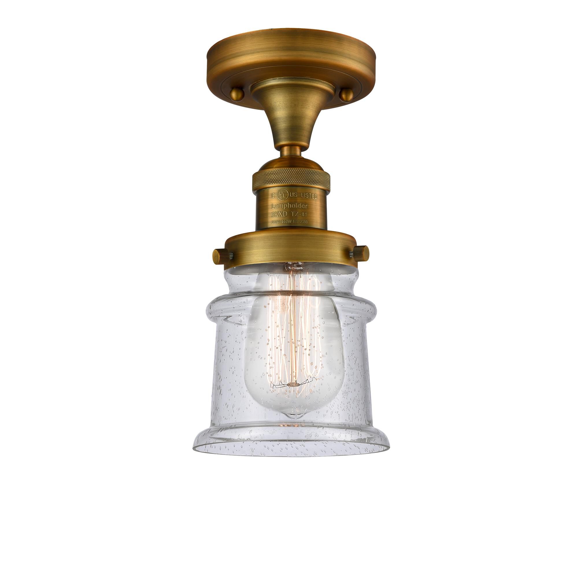 Shown in Brushed Brass finish and Seedy glass
