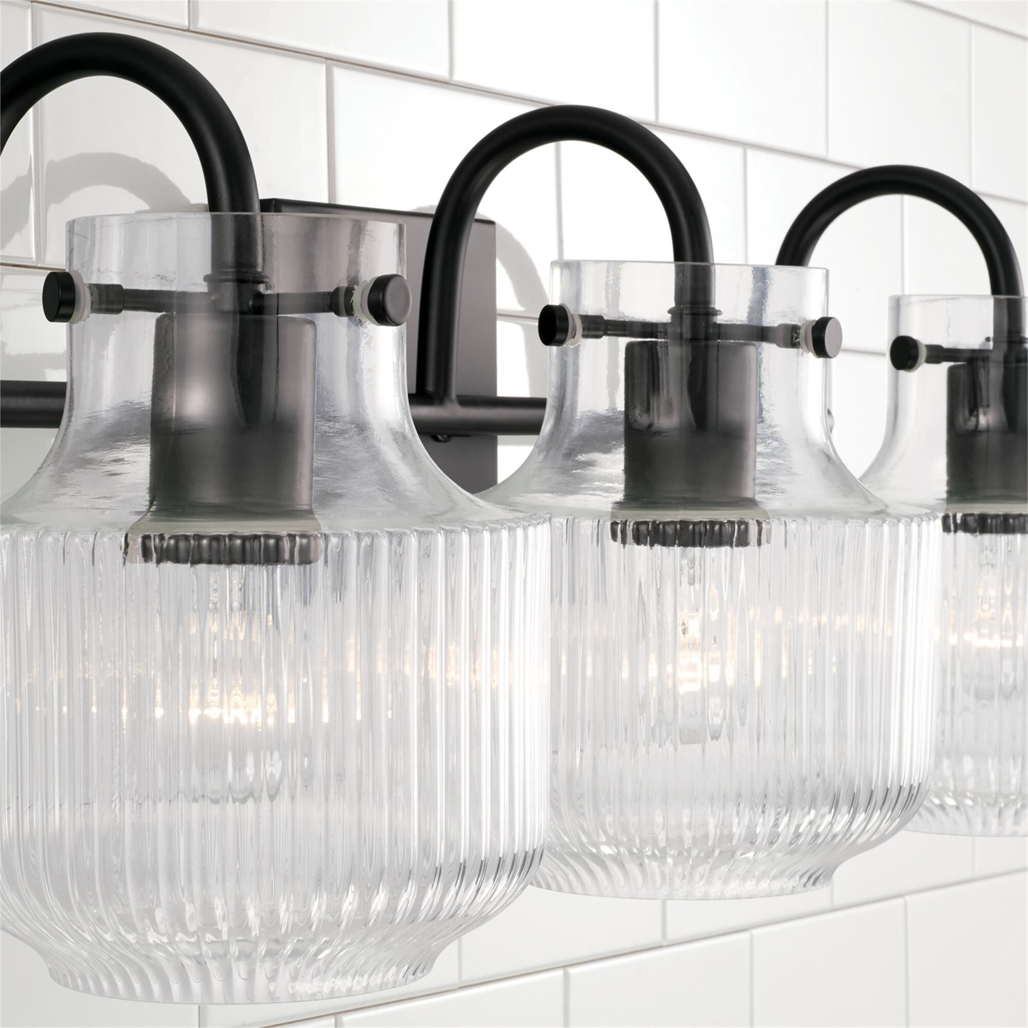 Shown in Matte Black finish and Clear Fluted glass