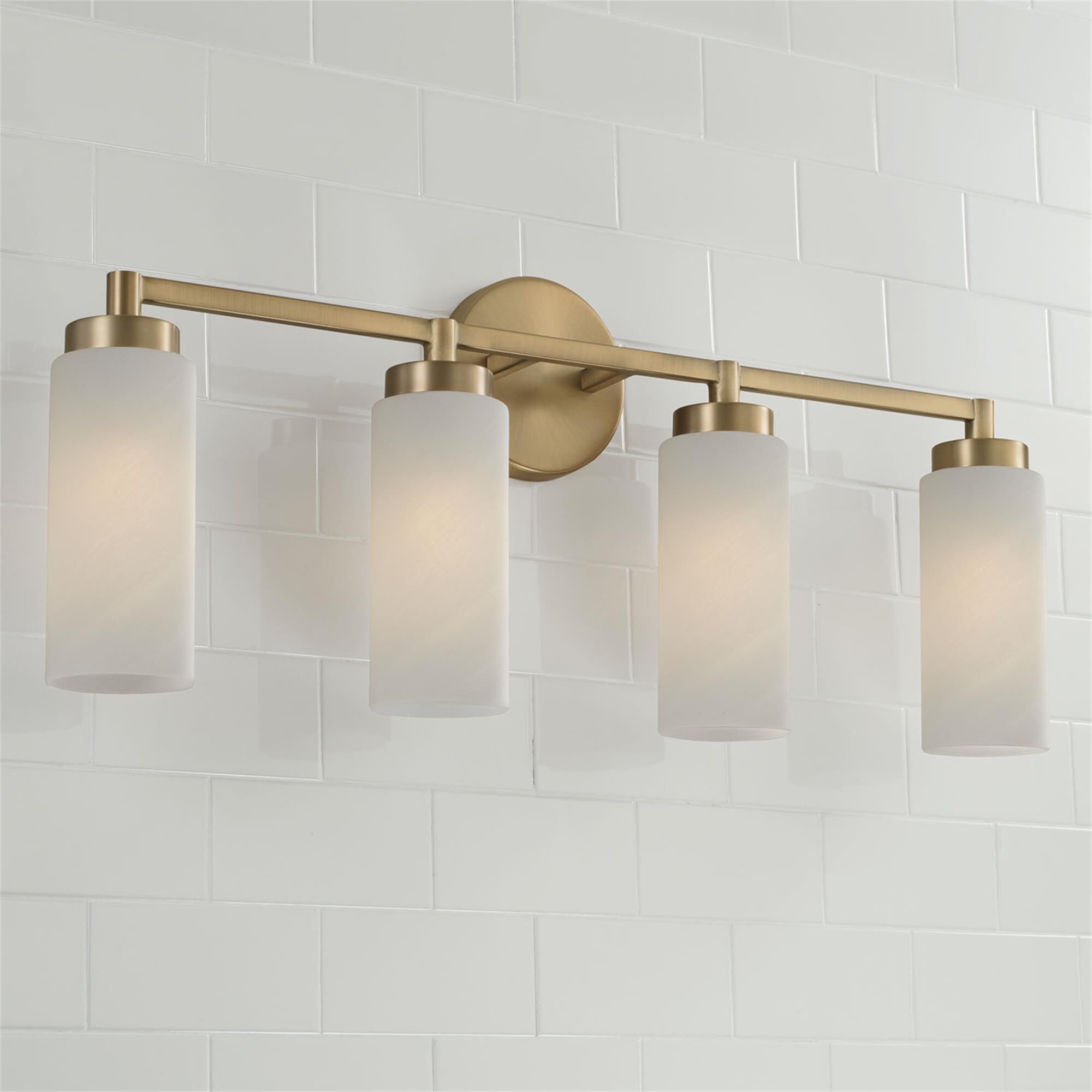 Shown in Aged Brass finish and Faux Alabaster glass