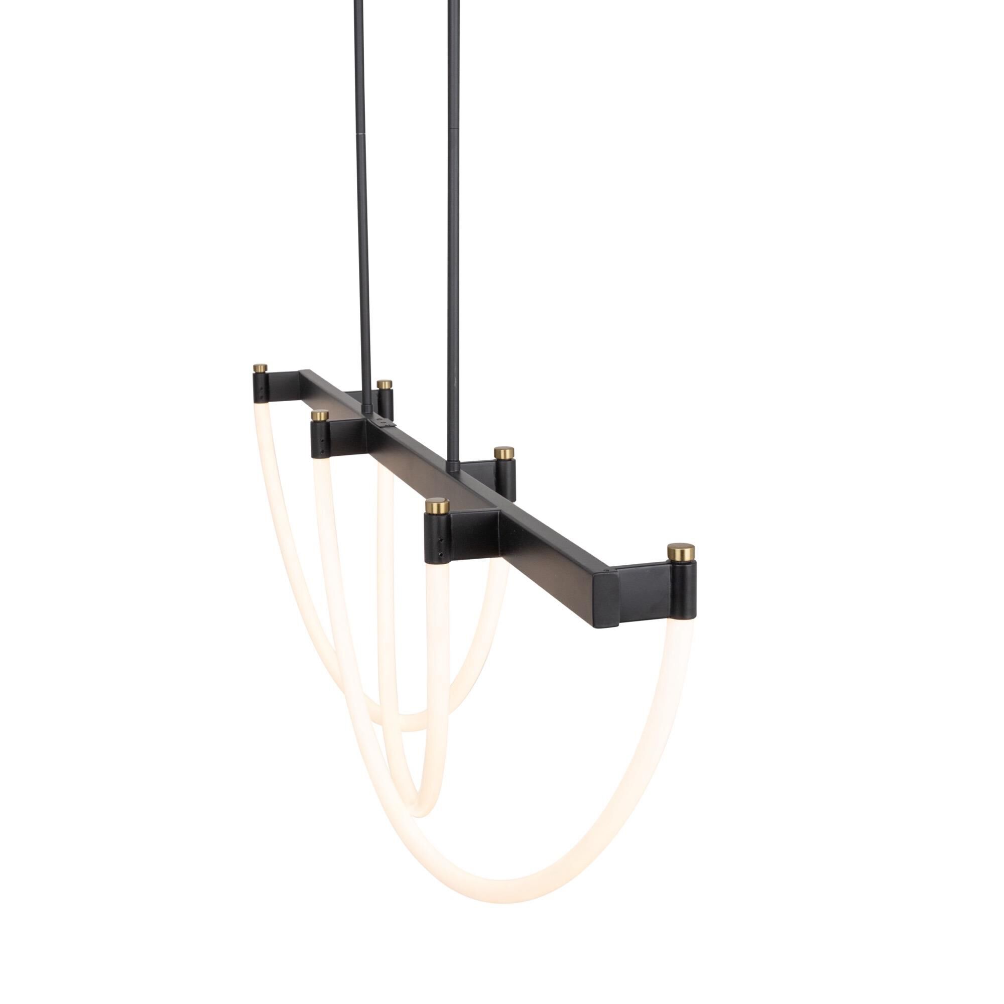 Shown in Black And Brushed Brass finish and Silicone shade