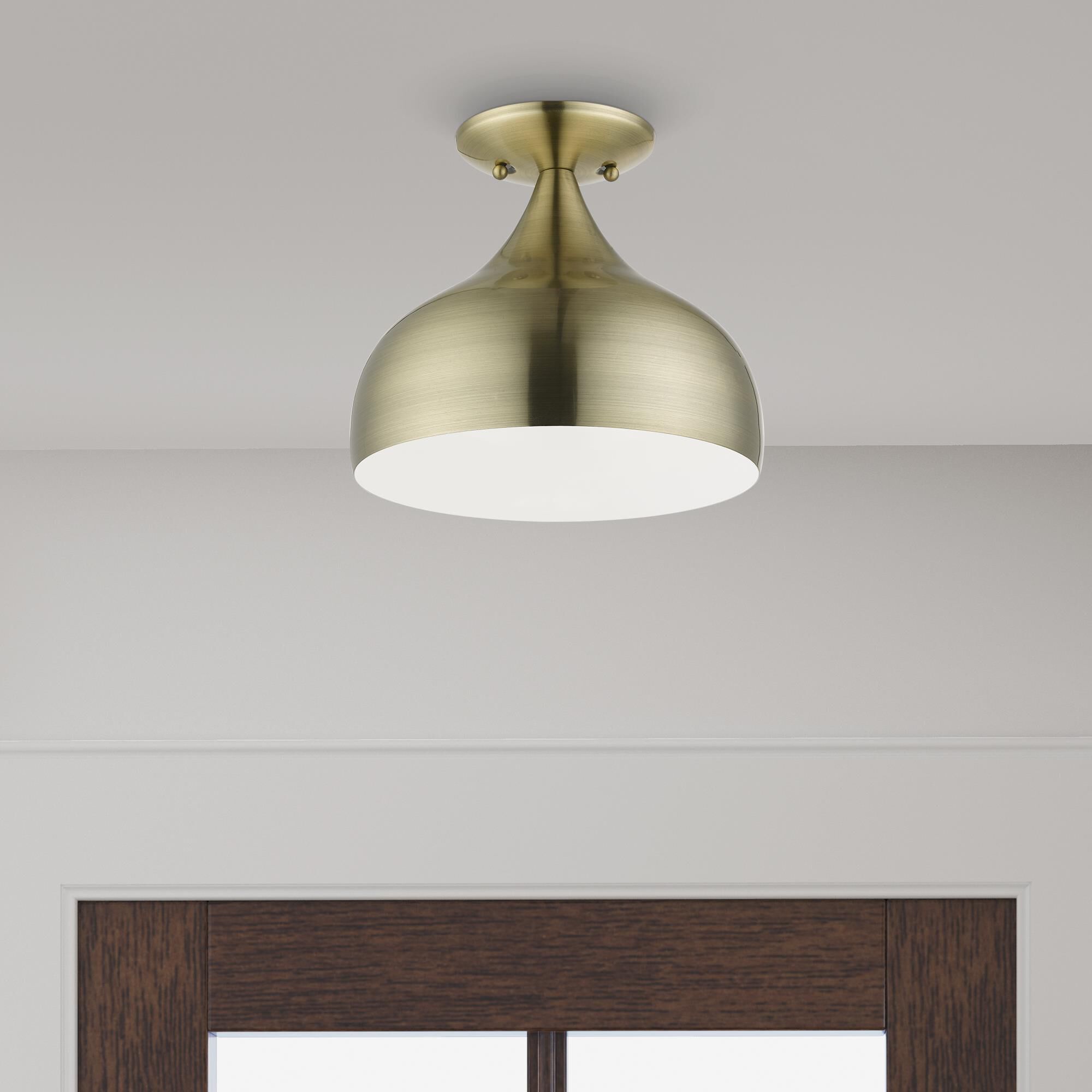 Shown in Antique Brass finish and Antique Brass with White Inside shade
