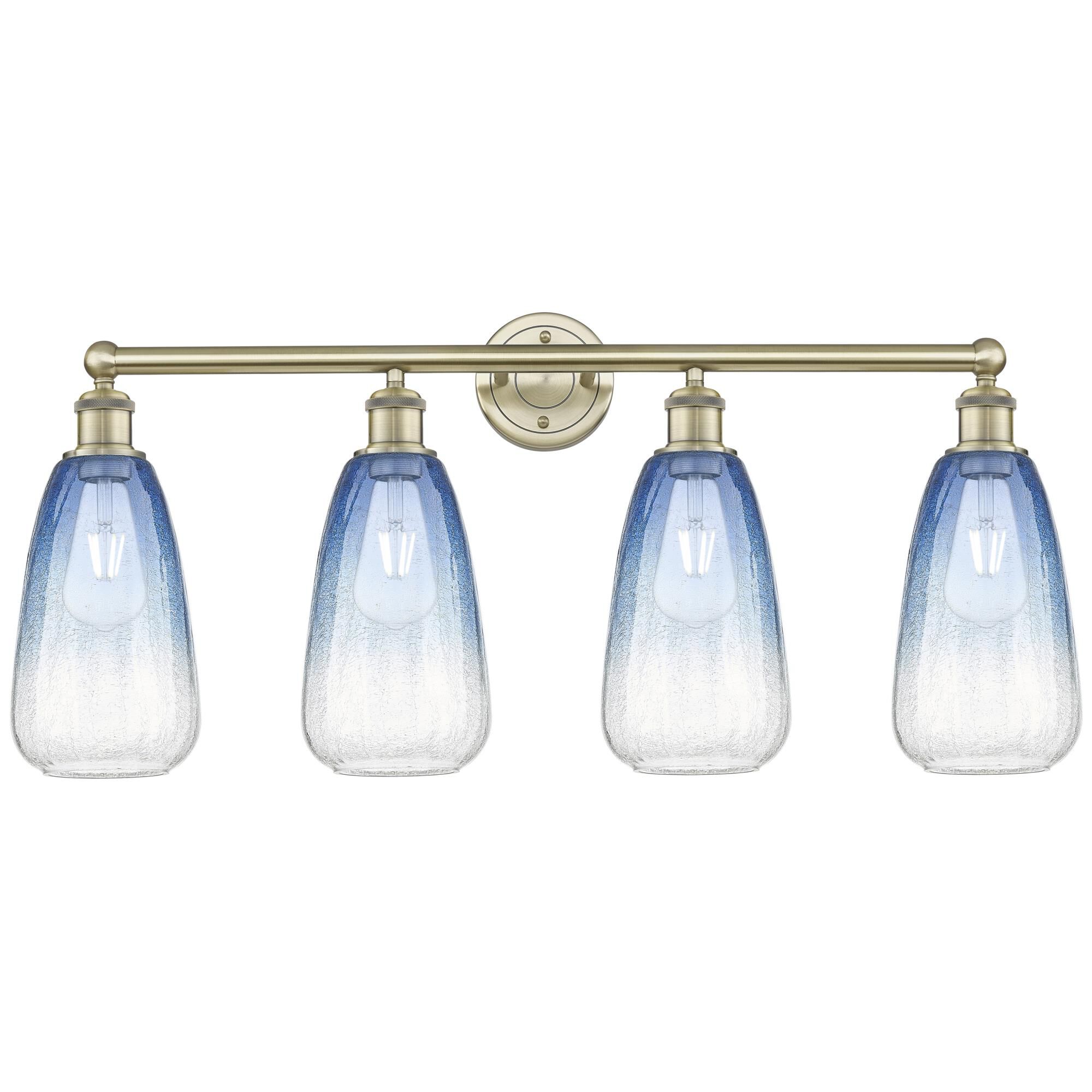Shown in Antique Brass finish and Sapphire Blue glass