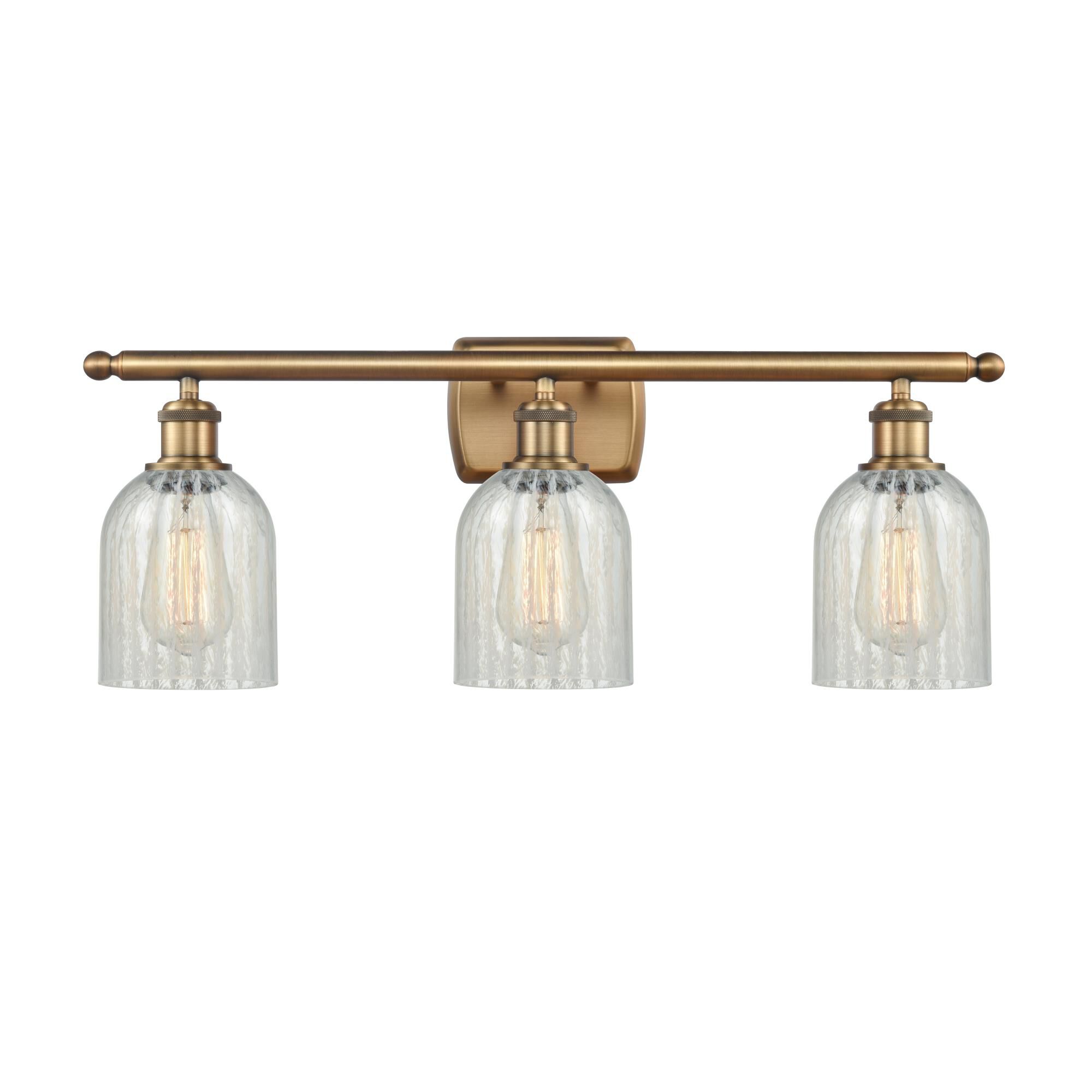 Shown in Brushed Brass finish and Bell glass and Glass shade