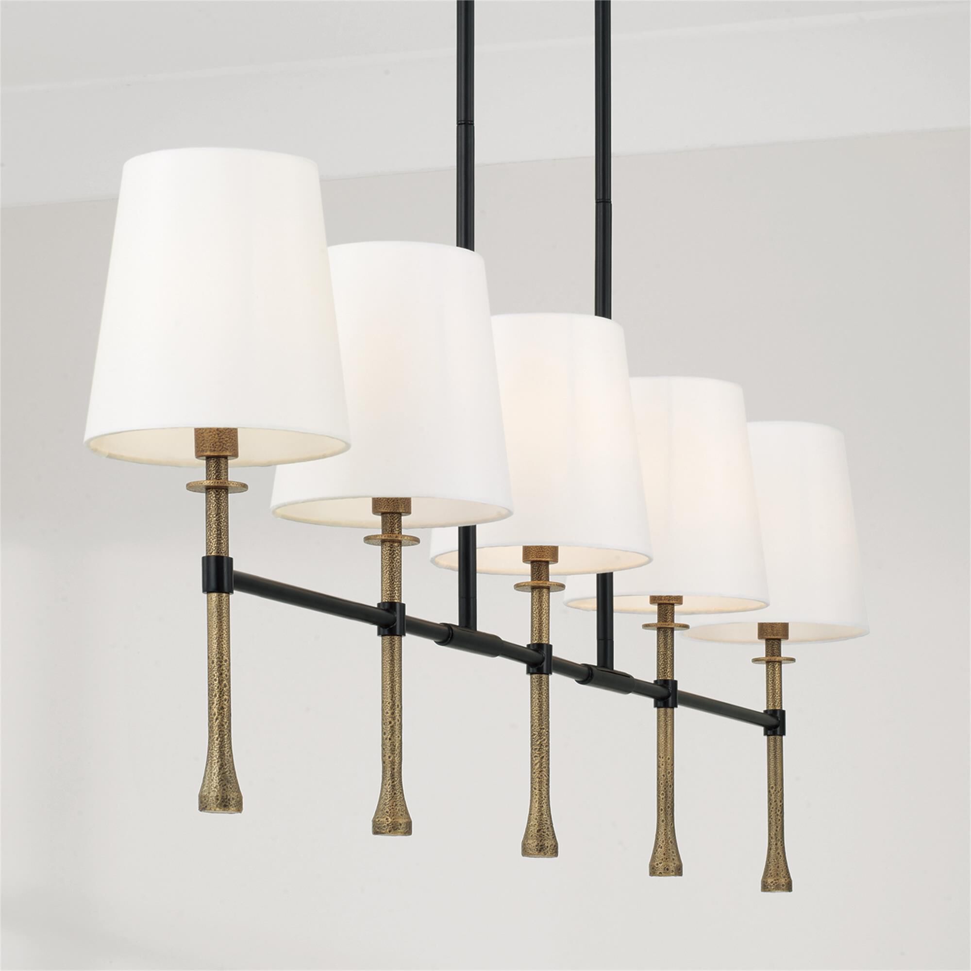 Shown in Matte Black With Hammered Gold finish and White Fabric Stay-Straight s shade