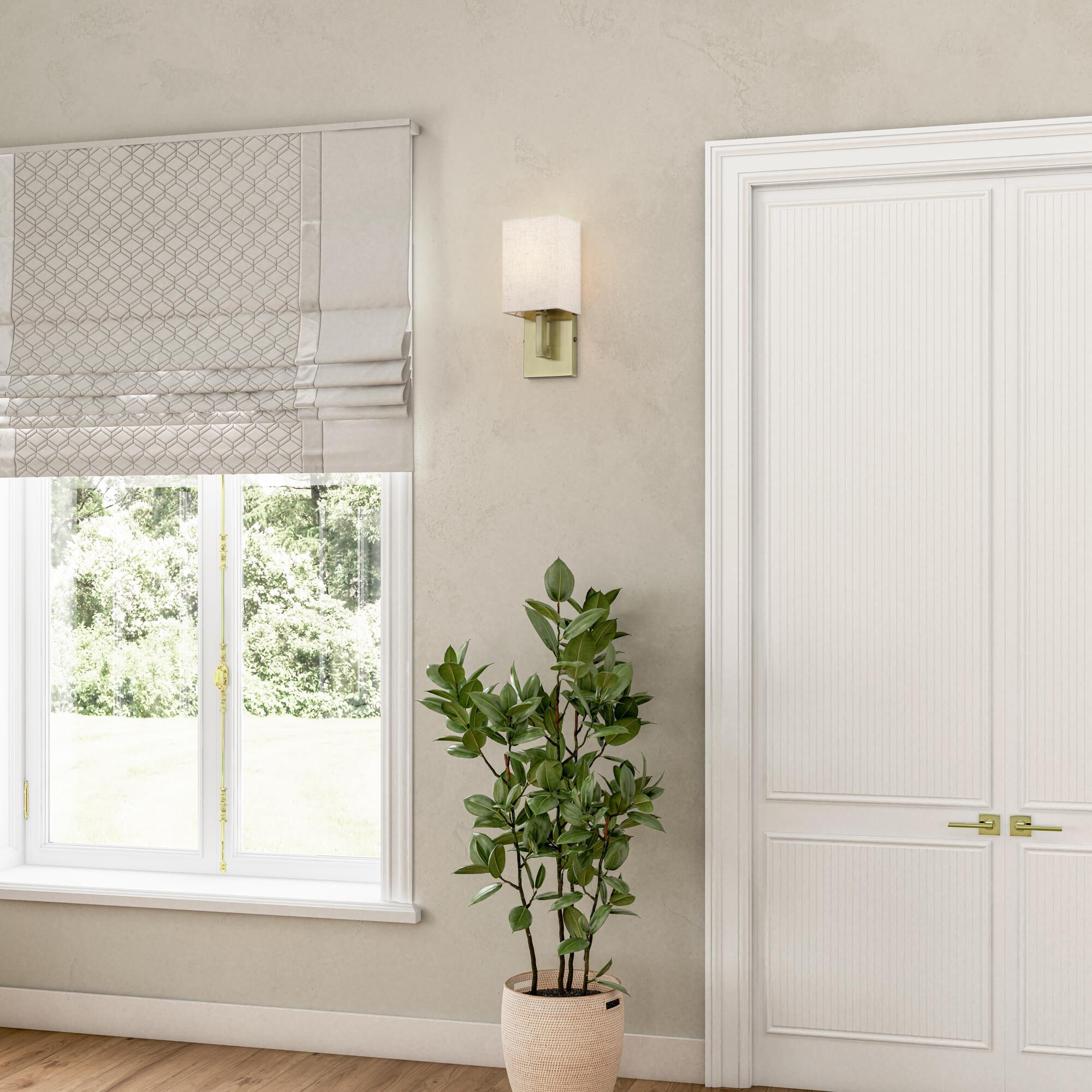 Shown in Antique Brass finish and Hand Crafted Oatmeal Color Fabric with White Color Inside shade