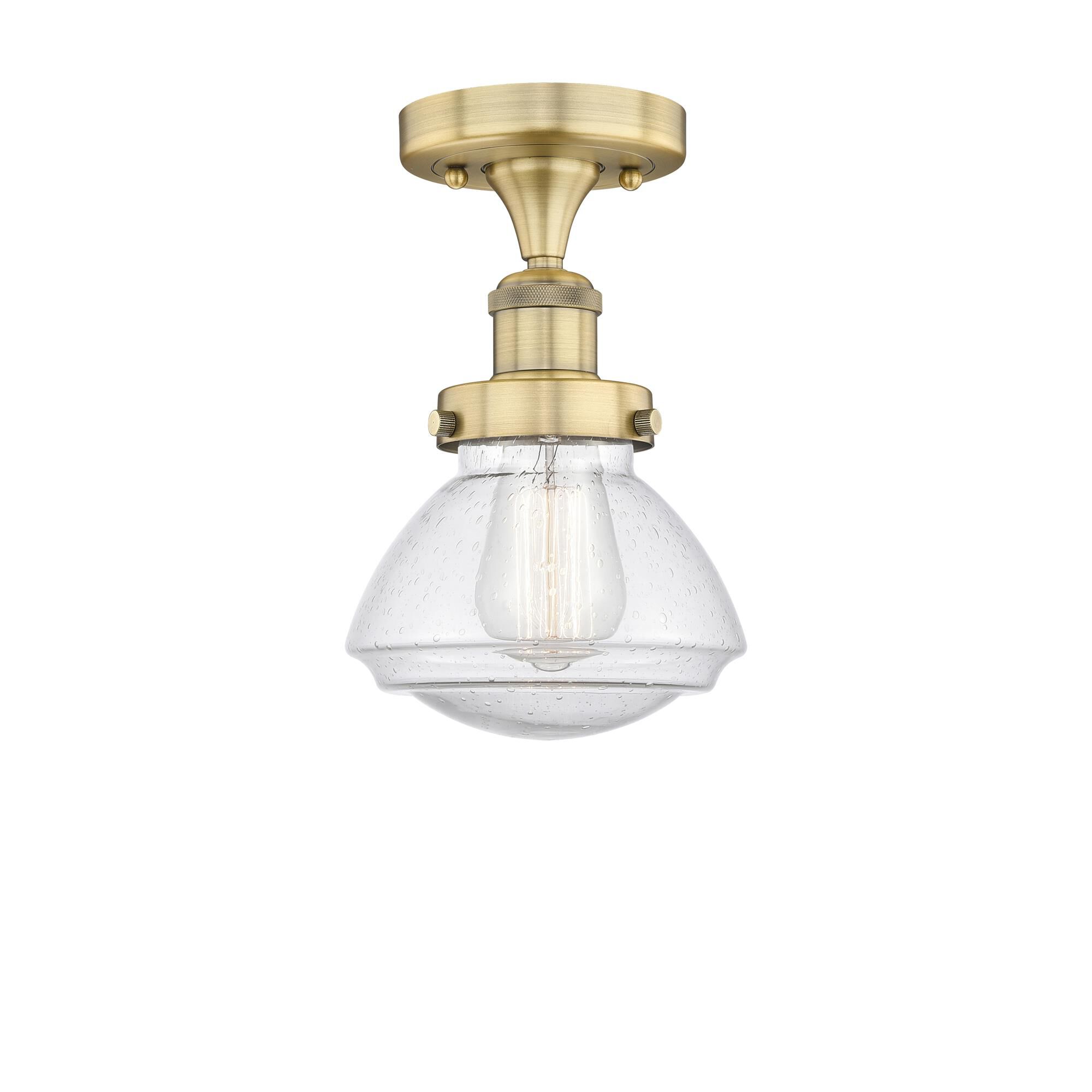 Shown in Brushed Brass finish and Seedy glass