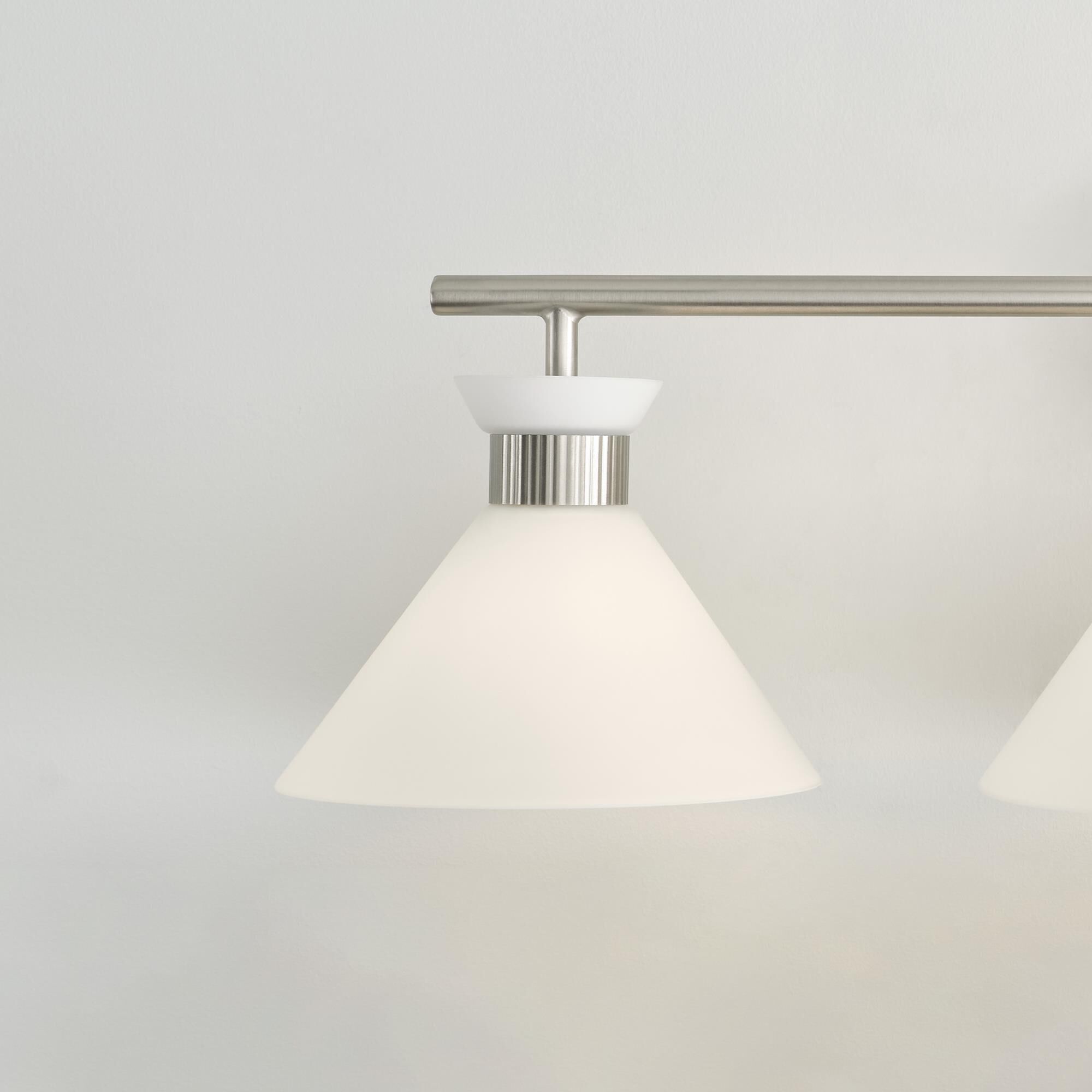 Shown in Brushed Steel finish and Etched White glass