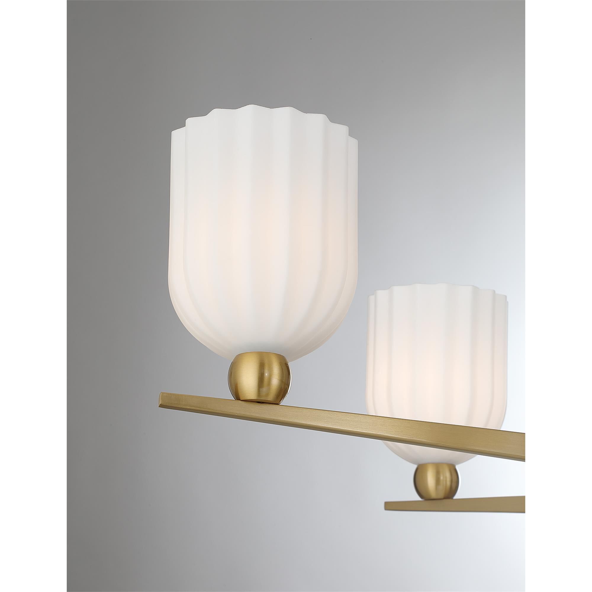 Shown in Warm Brass finish and White Opal Ribbed glass and White Resin accent