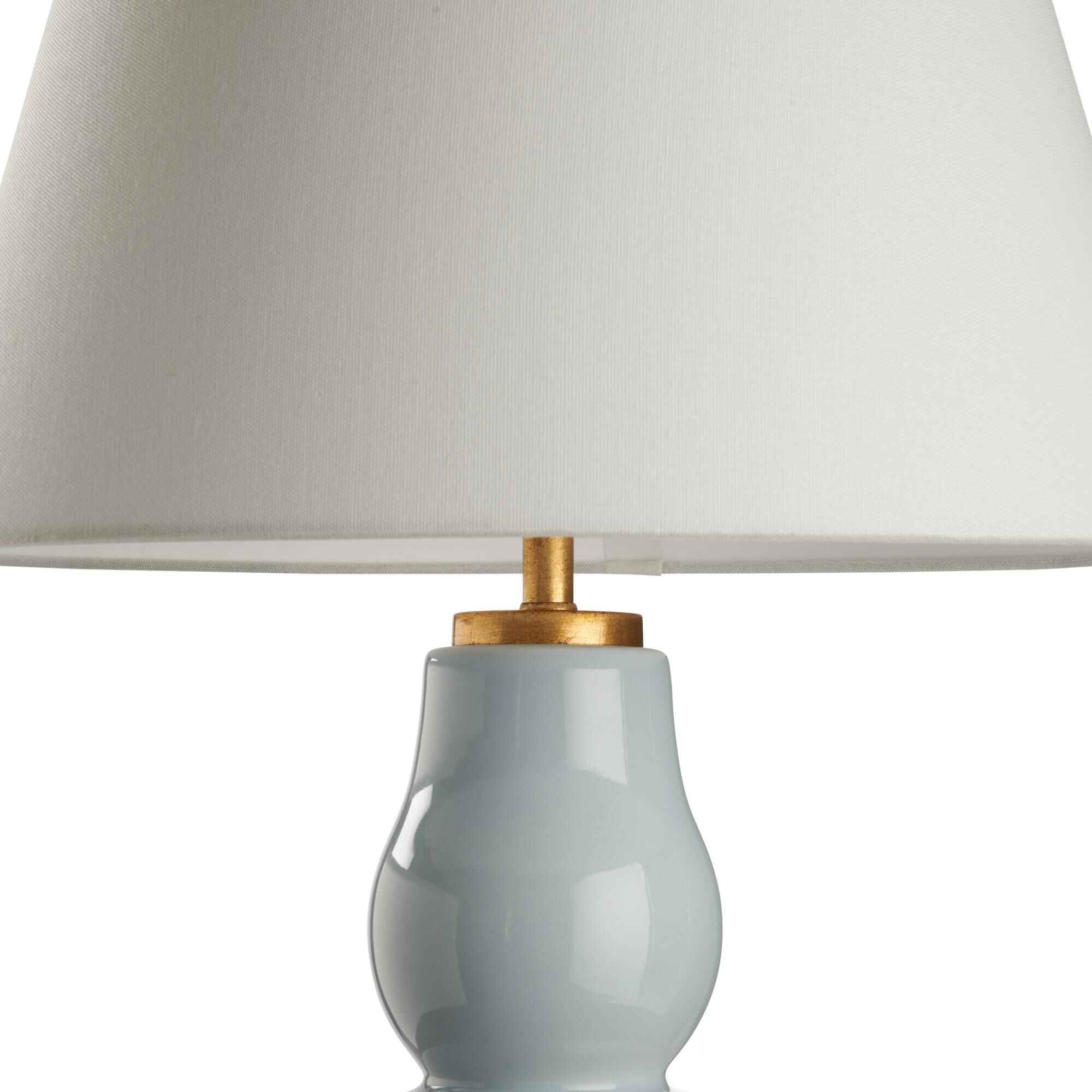 Shown in Blue and Gold finish and Linen shade
