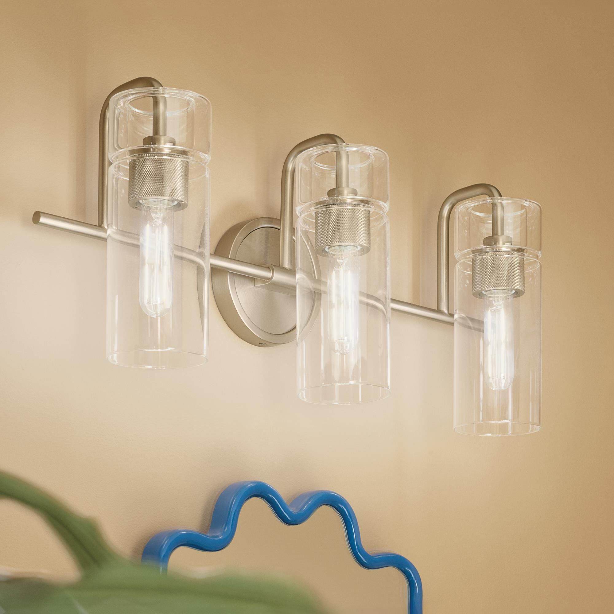Shown in Champagne Bronze finish and Clear glass