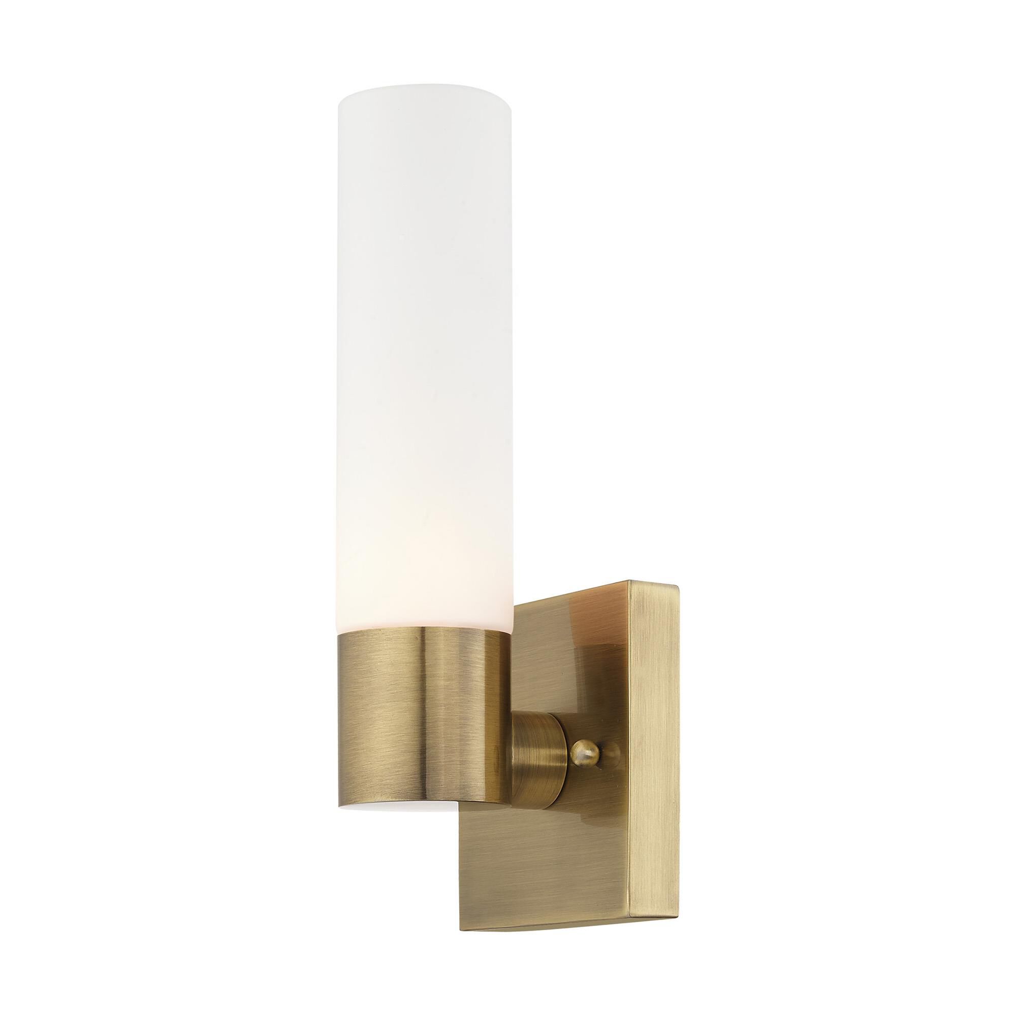 Shown in Antique Brass finish and Hand Blown Satin Opal White Twist Lock glass