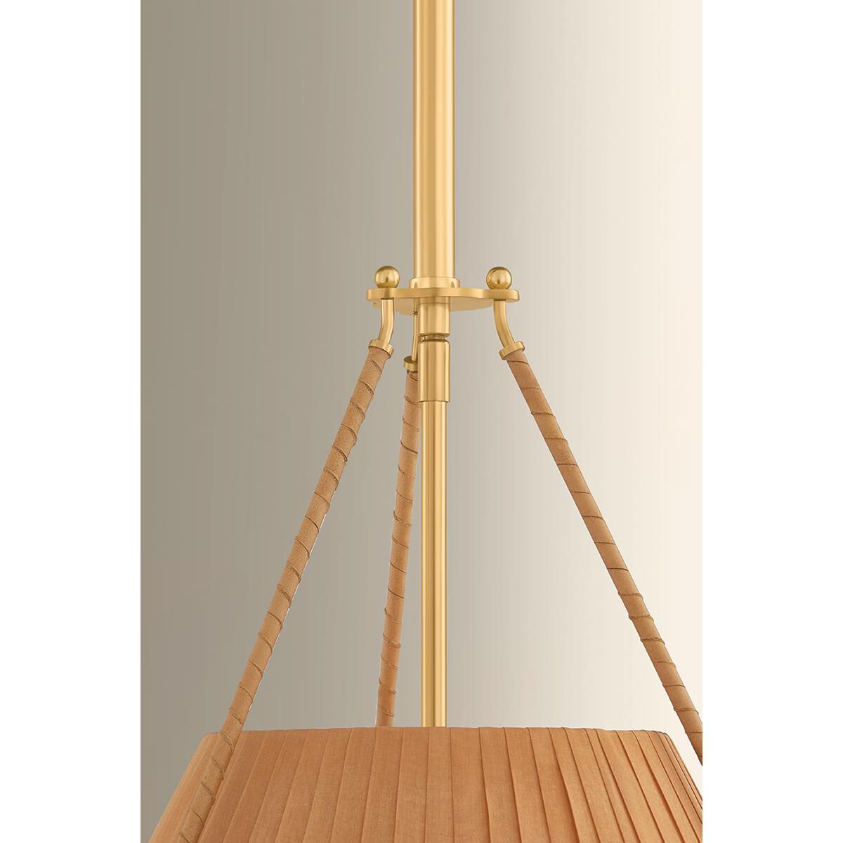 Shown in Aged Brass finish and Garnet Linen shade