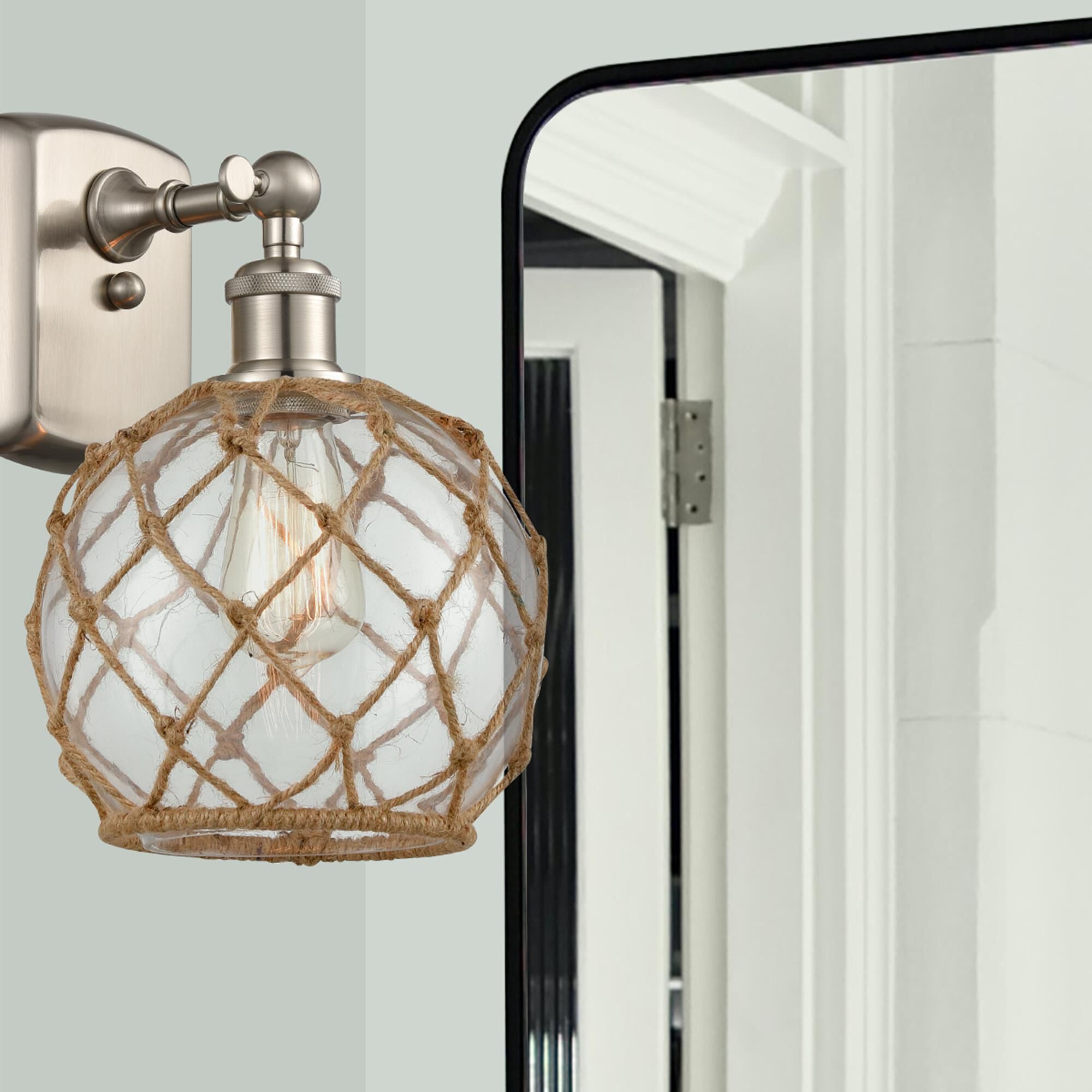 Shown in Brushed Satin Nickel finish and Clear With Black Rope glass