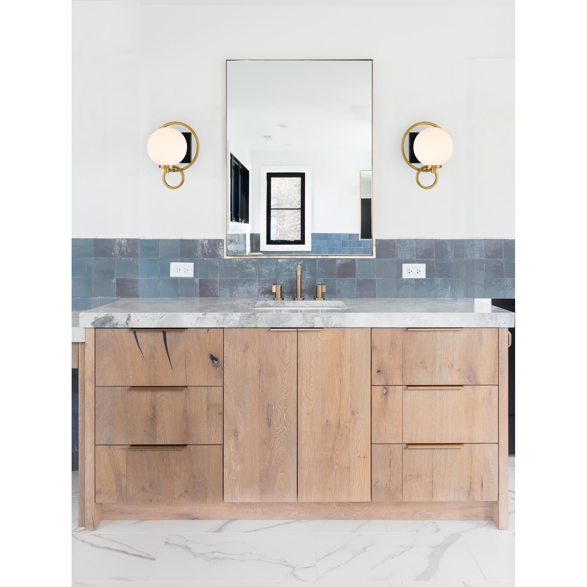 Shown in Matte Black With Warm Brass finish and Soft Frosted glass