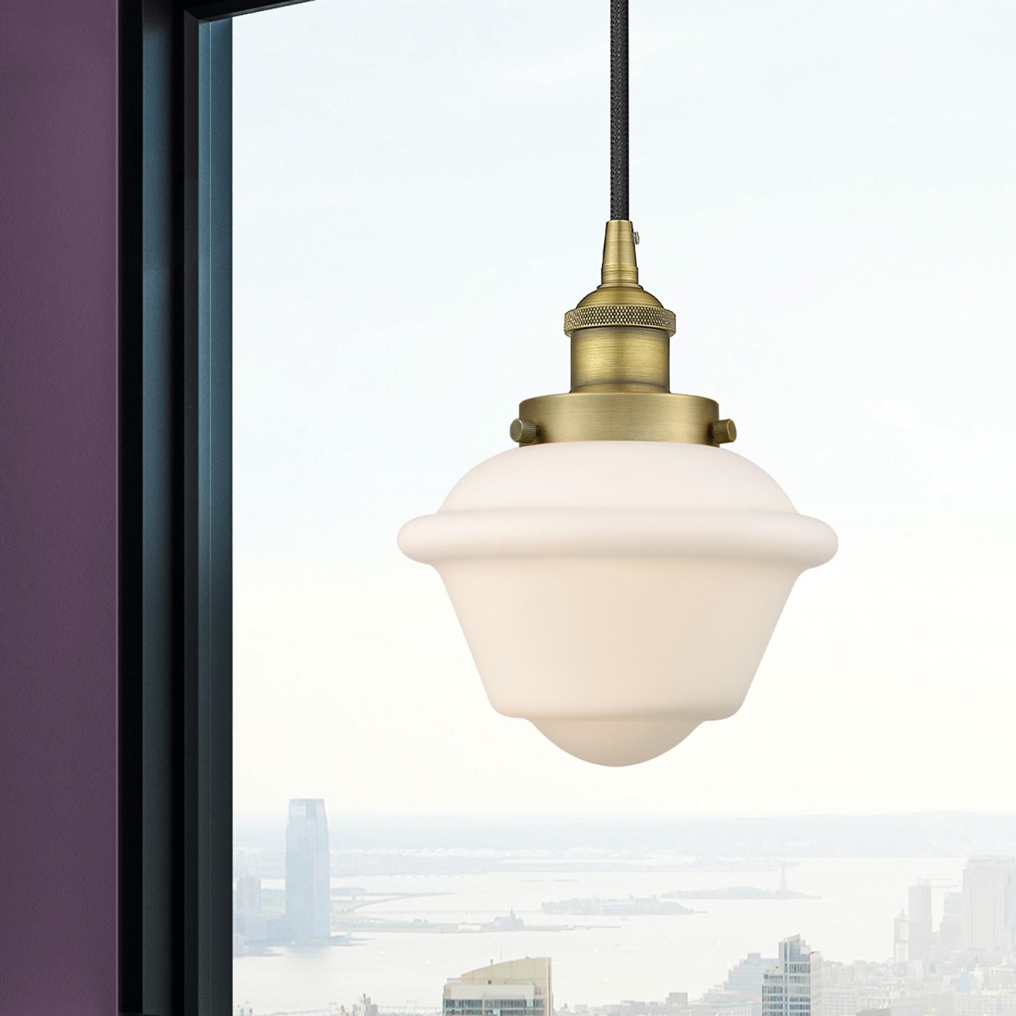 Shown in Brushed Brass finish and Matte White Cased Small Oxford glass