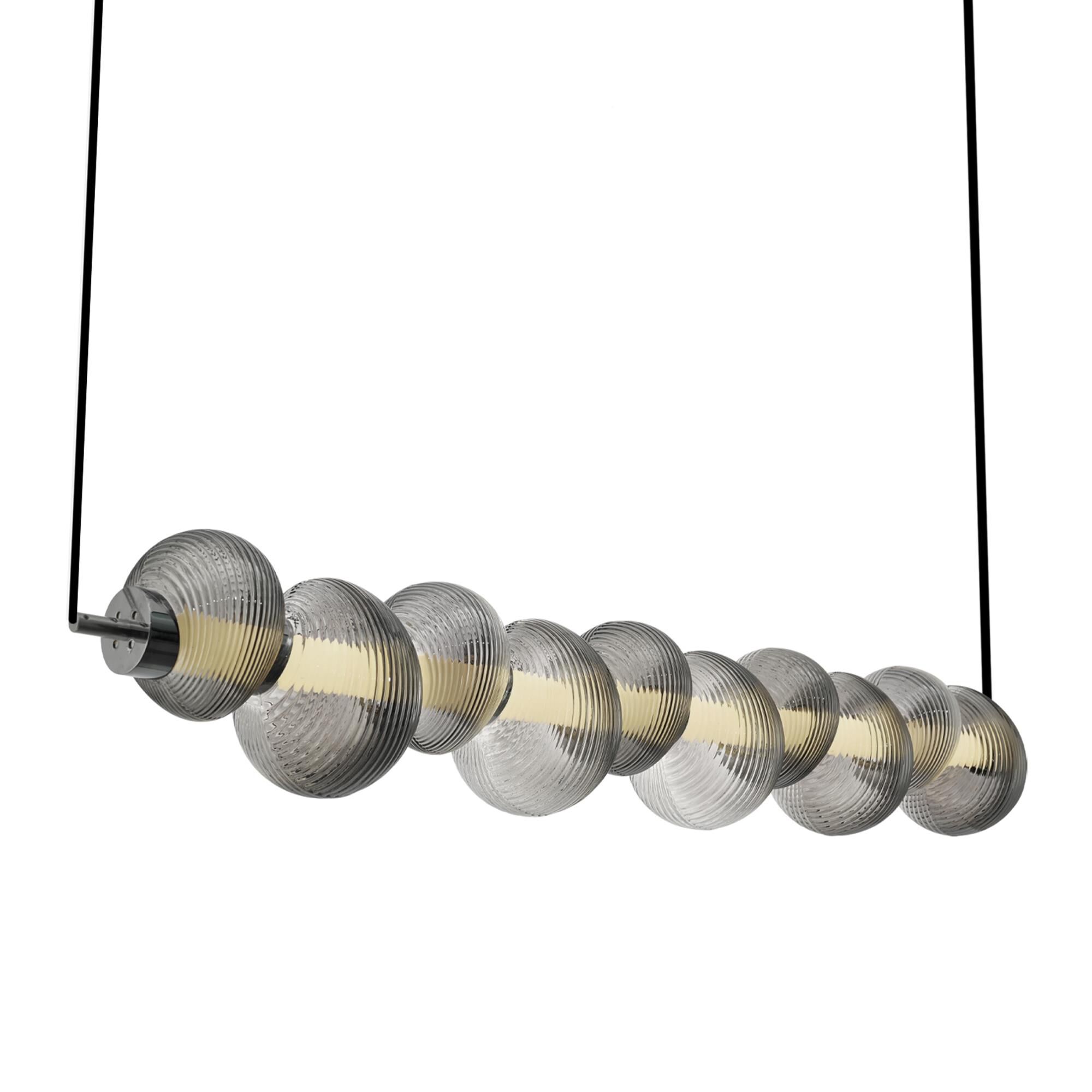 Shown in Chrome finish and Ribbed Smoke Ombre glass