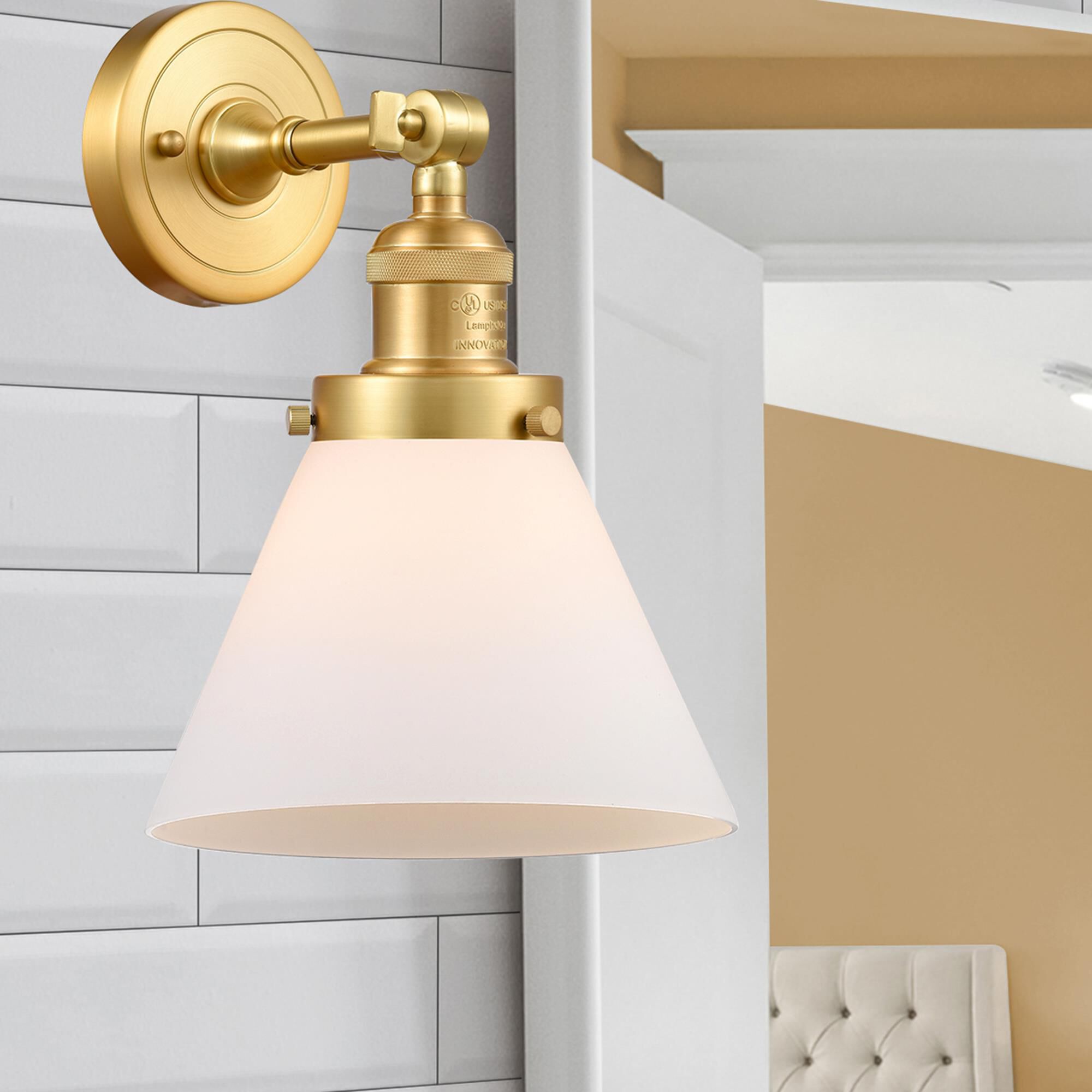 Shown in Satin Gold finish and Matte White Cased Large Cone glass