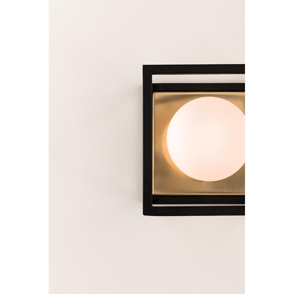 Shown in Aged Brass finish and Opal Etched glass and Black accent