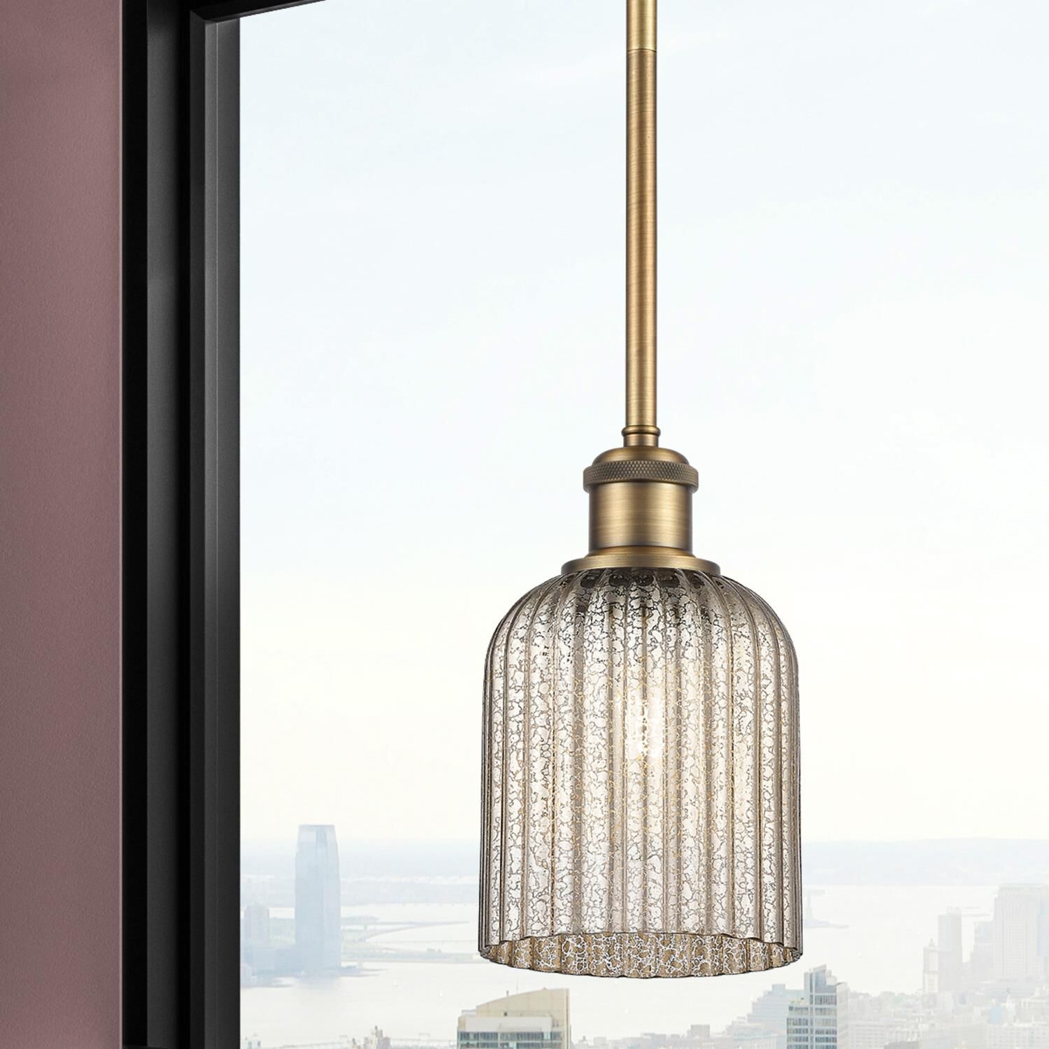 Shown in Brushed Brass finish and Mercury glass