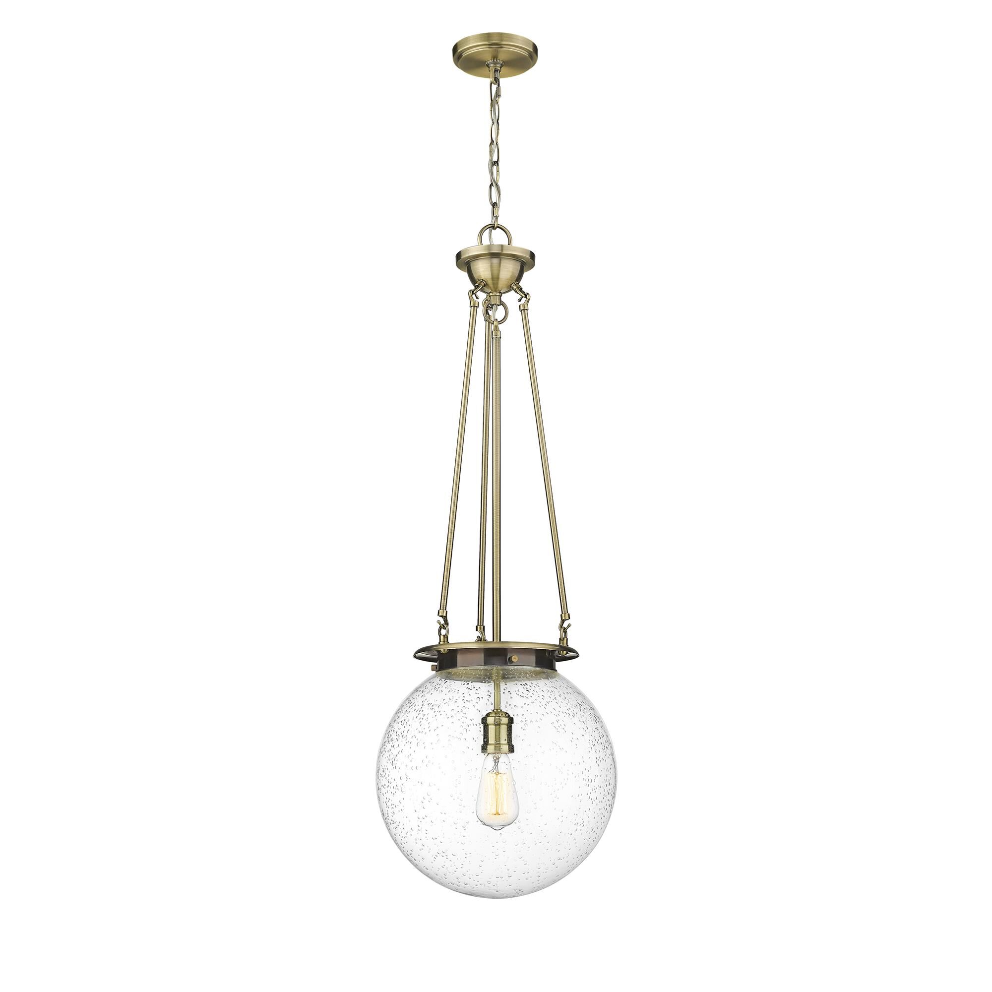 Shown in Antique Brass finish and Seedy glass