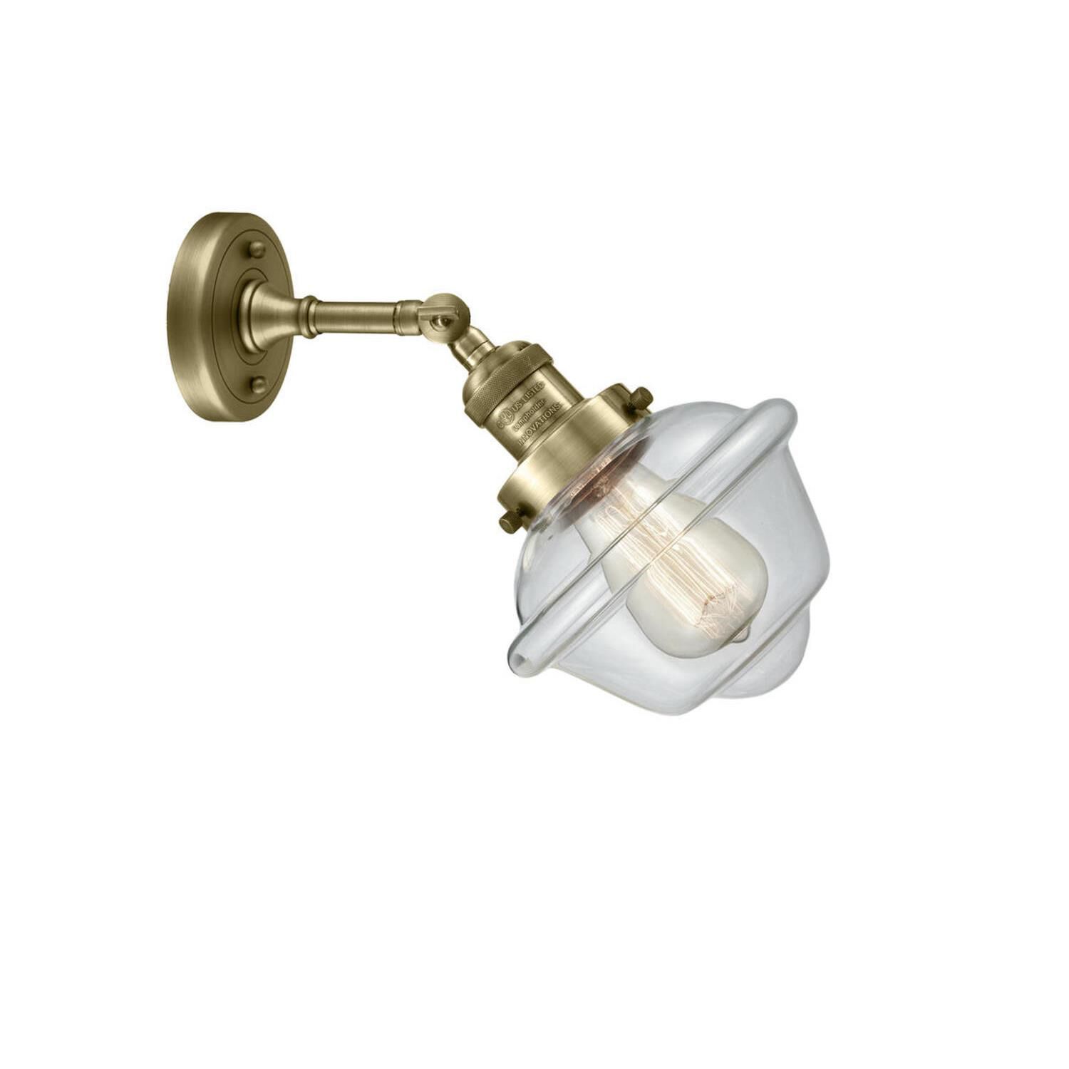 Shown in Antique Brass finish and Clear glass