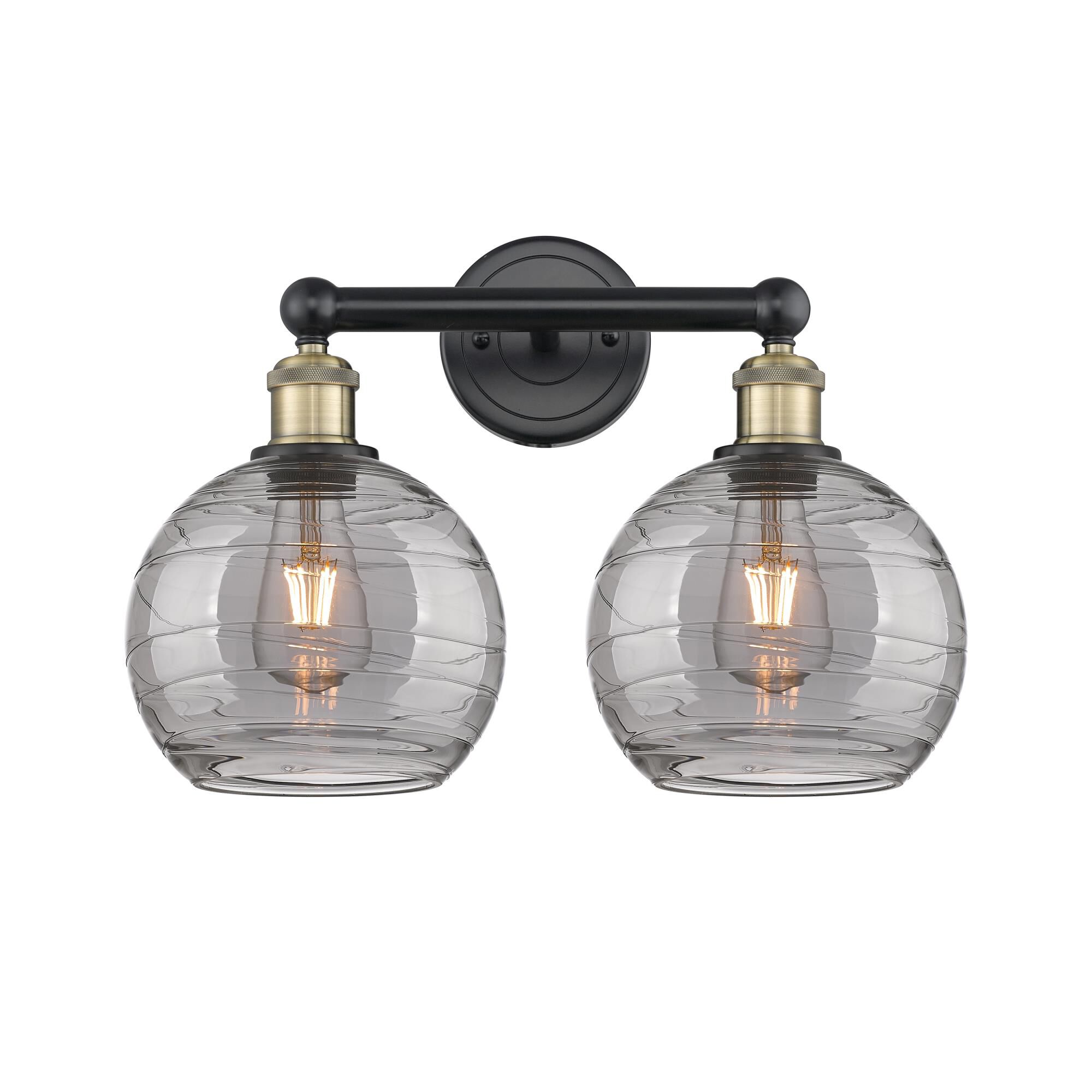 Shown in Black Antique Brass finish and Light Smoke Deco Swirl glass