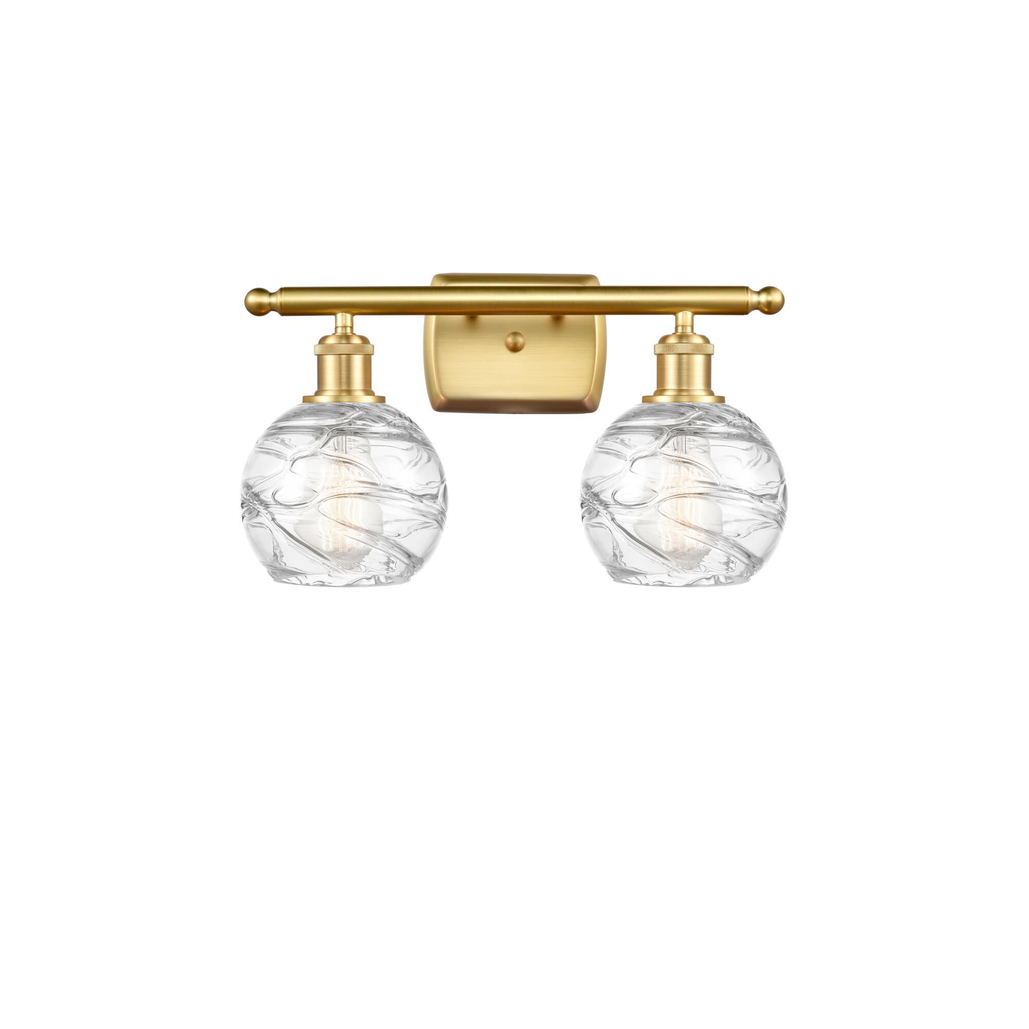 Shown in Satin Gold finish and Clear Deco Swirl glass