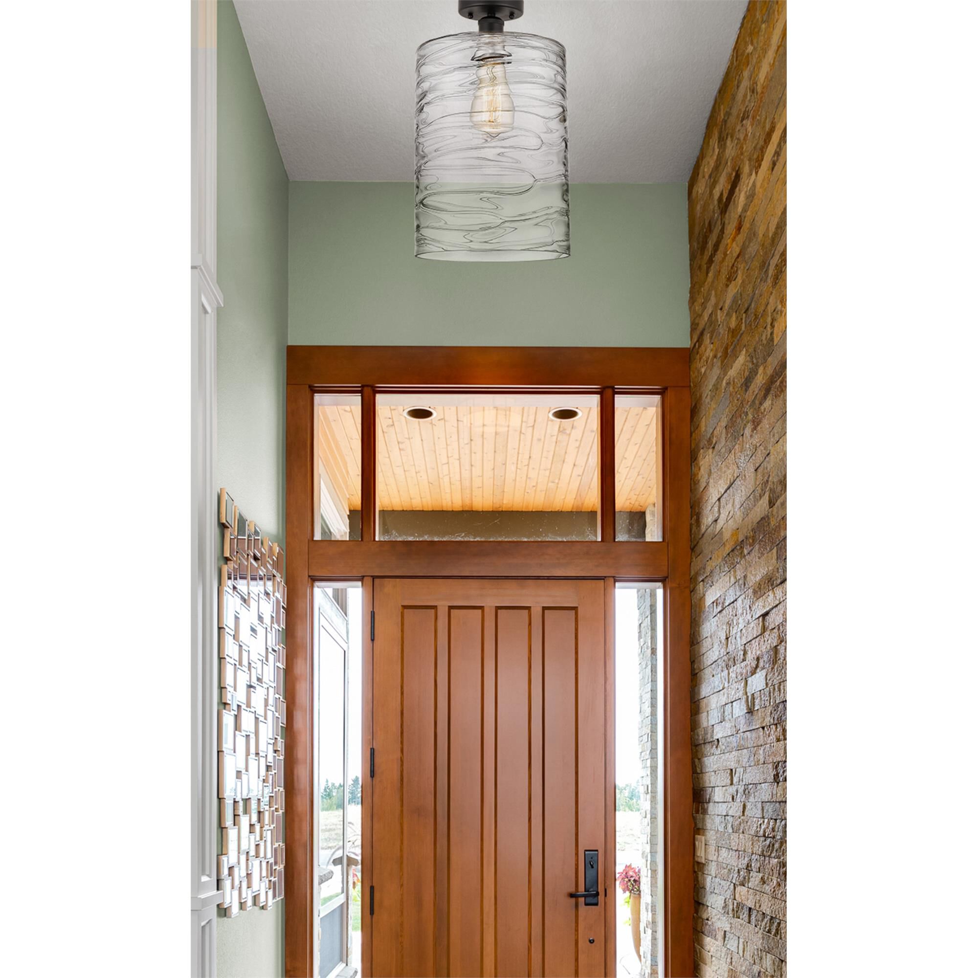 Shown in Oil Rubbed Bronze finish and Deco Swirl glass