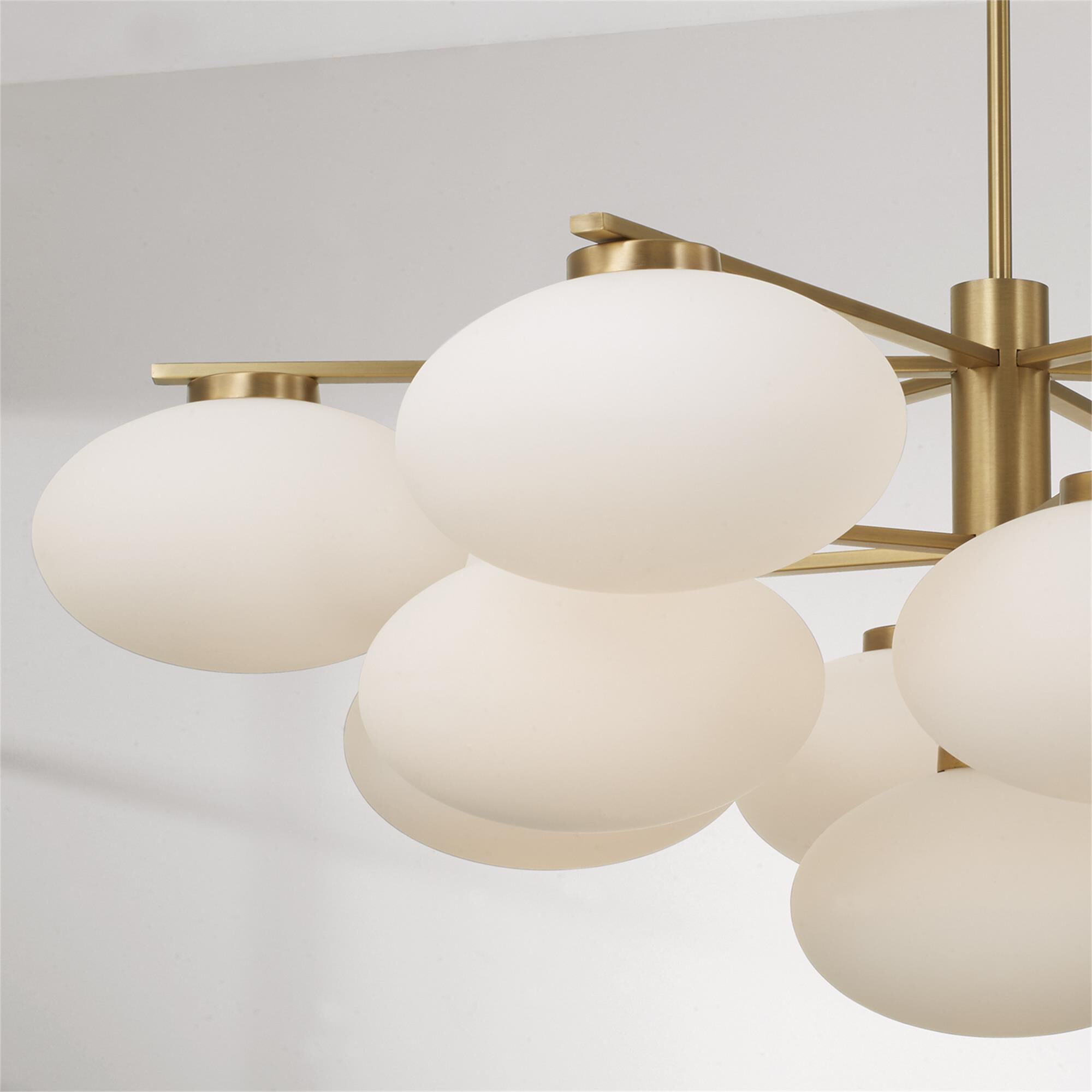 Shown in Aged Brass finish and Soft White glass