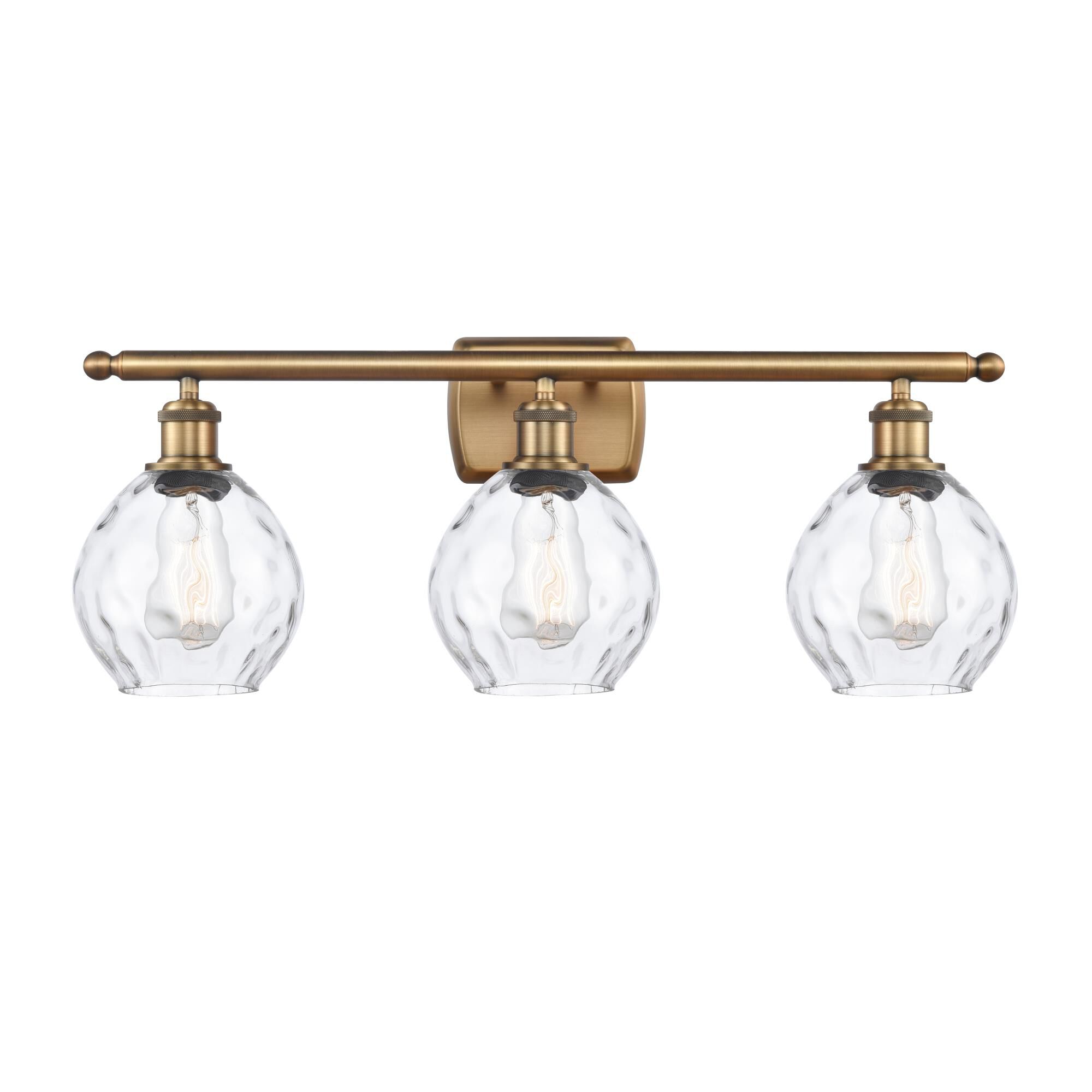 Shown in Brushed Brass finish and Clear Small Waverly glass