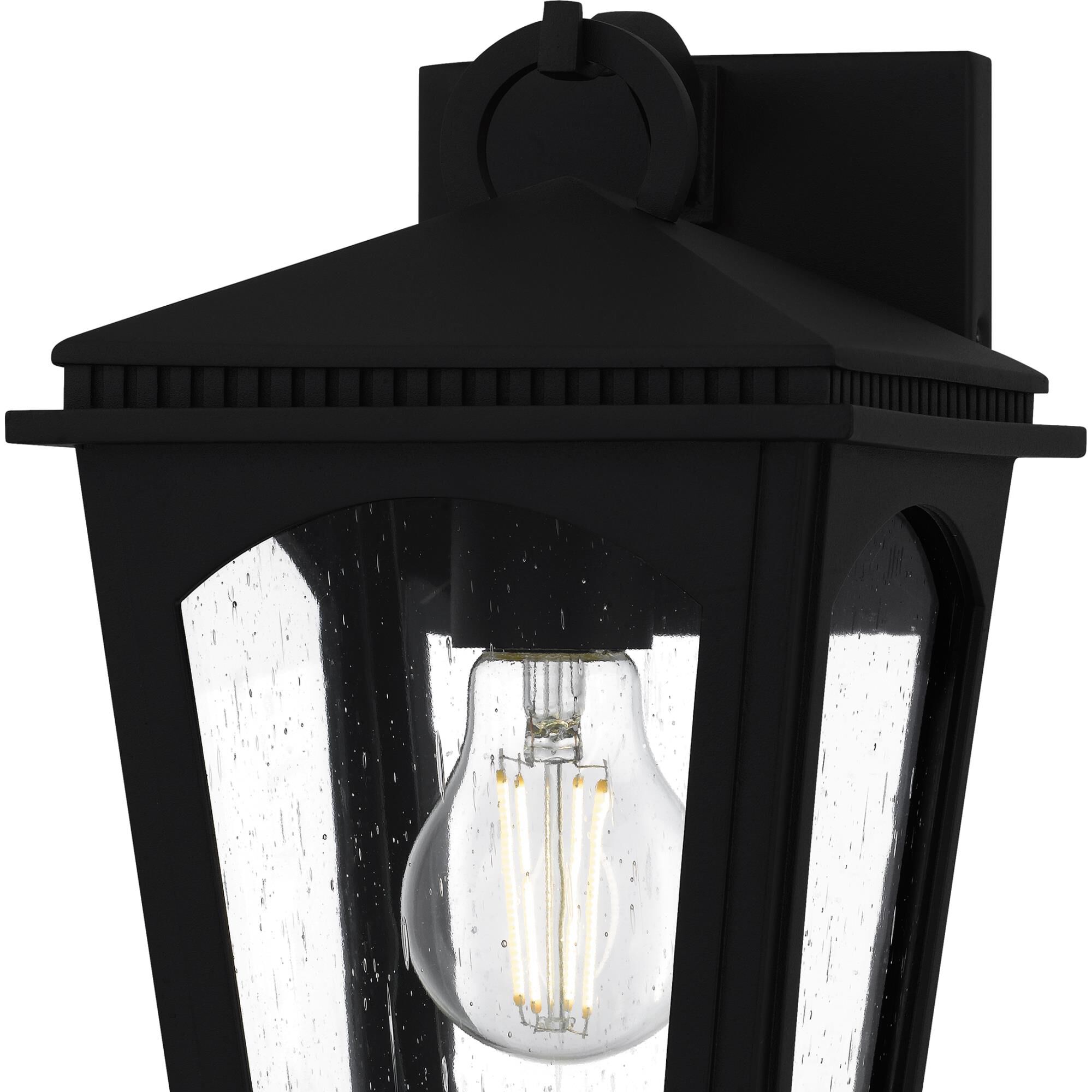 Shown in Earth Black finish and Clear Seedy Glass shade