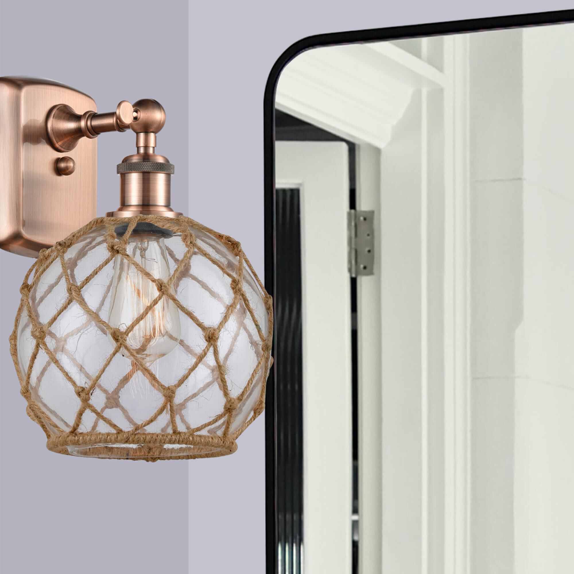 Shown in Antique Copper finish and Sphere glass and Glass And Rope shade