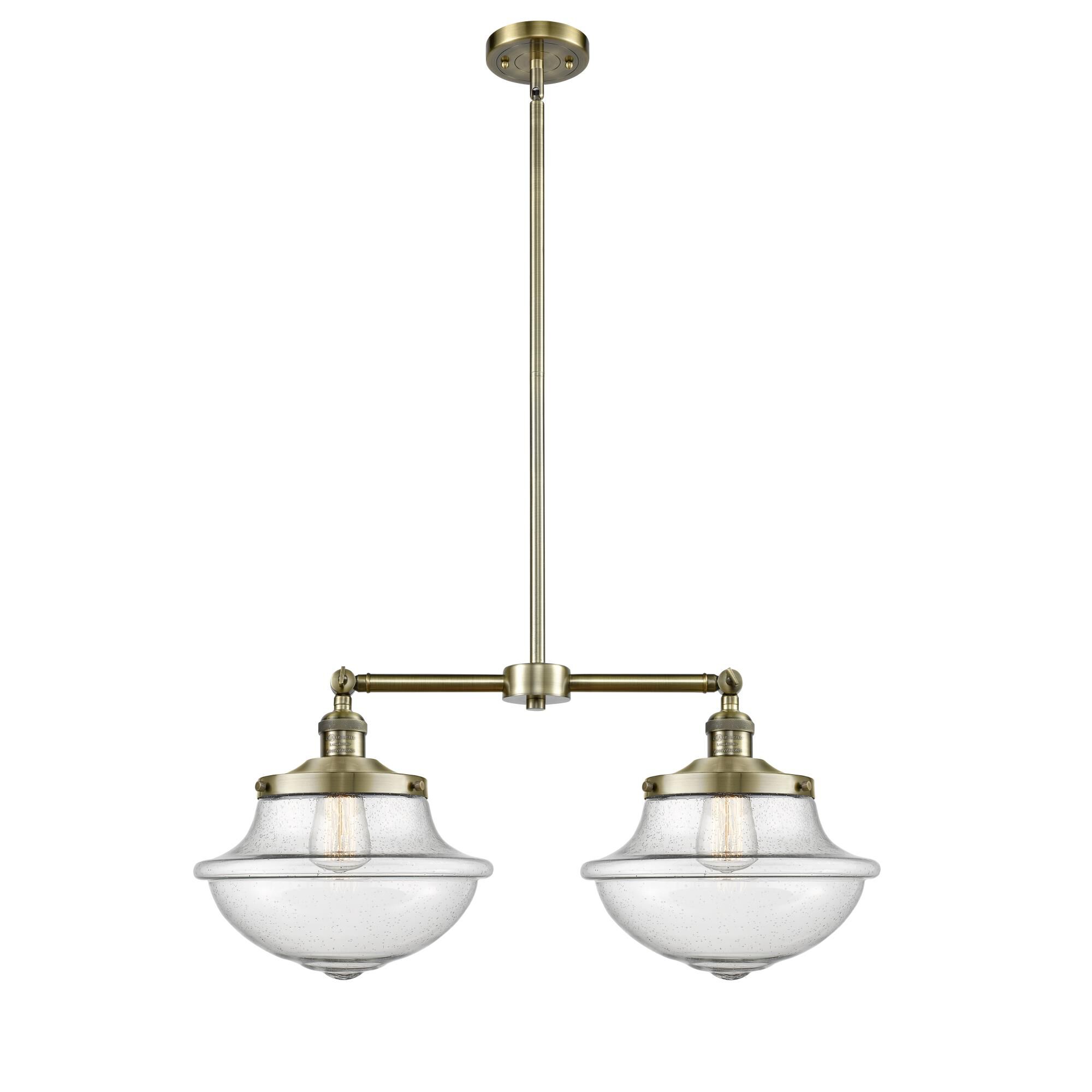 Shown in Antique Brass finish and Schoolhouse glass and Glass shade